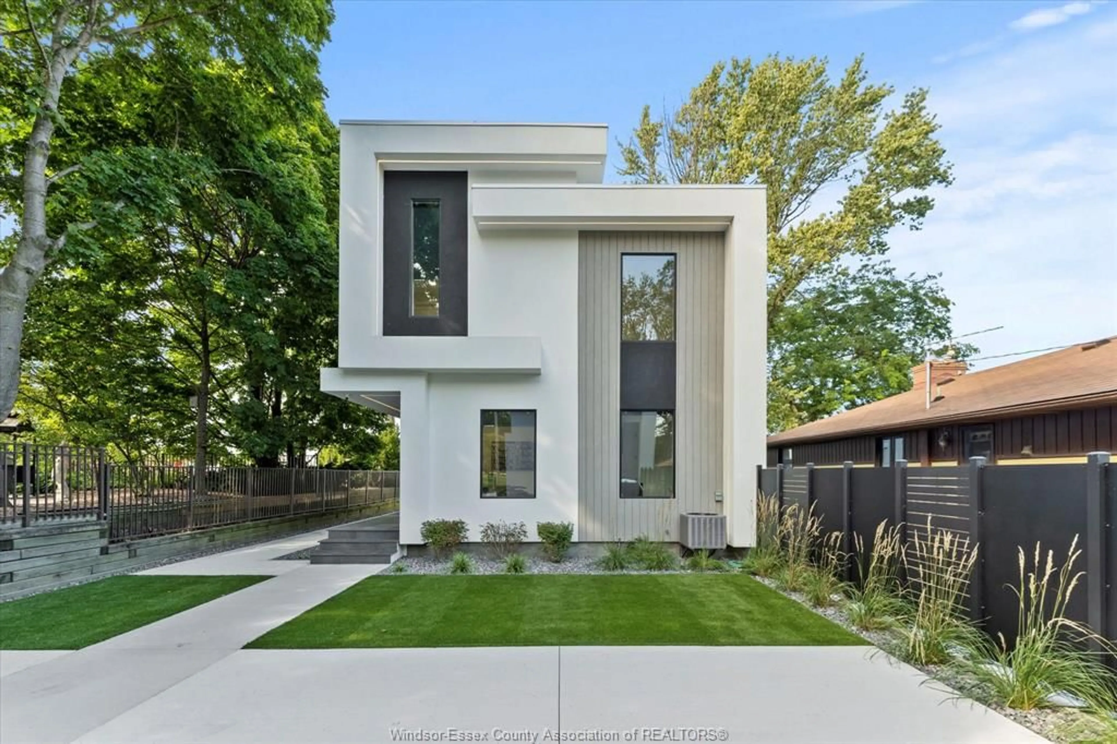 Home with brick exterior material, street for 754 OLD TECUMSEH Rd, Lakeshore Ontario N0R 1A0