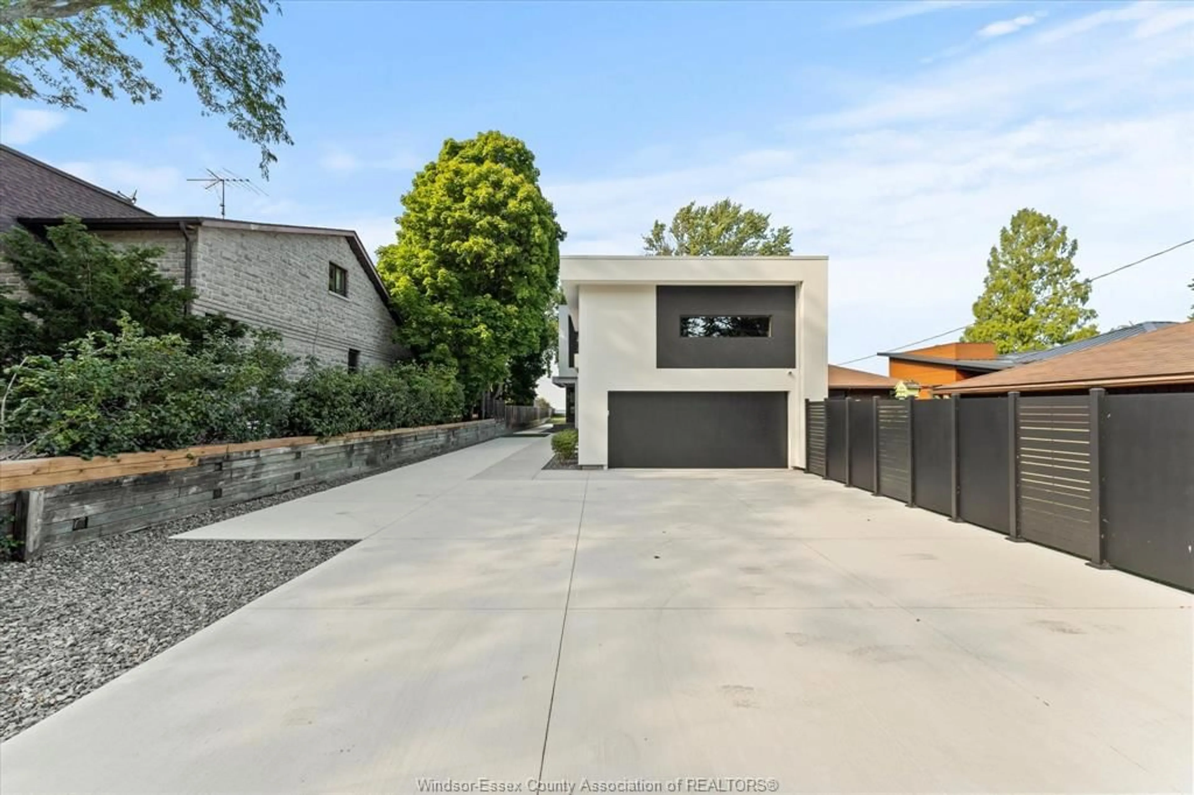 A pic from outside/outdoor area/front of a property/back of a property/a pic from drone, street for 754 OLD TECUMSEH Rd, Lakeshore Ontario N0R 1A0