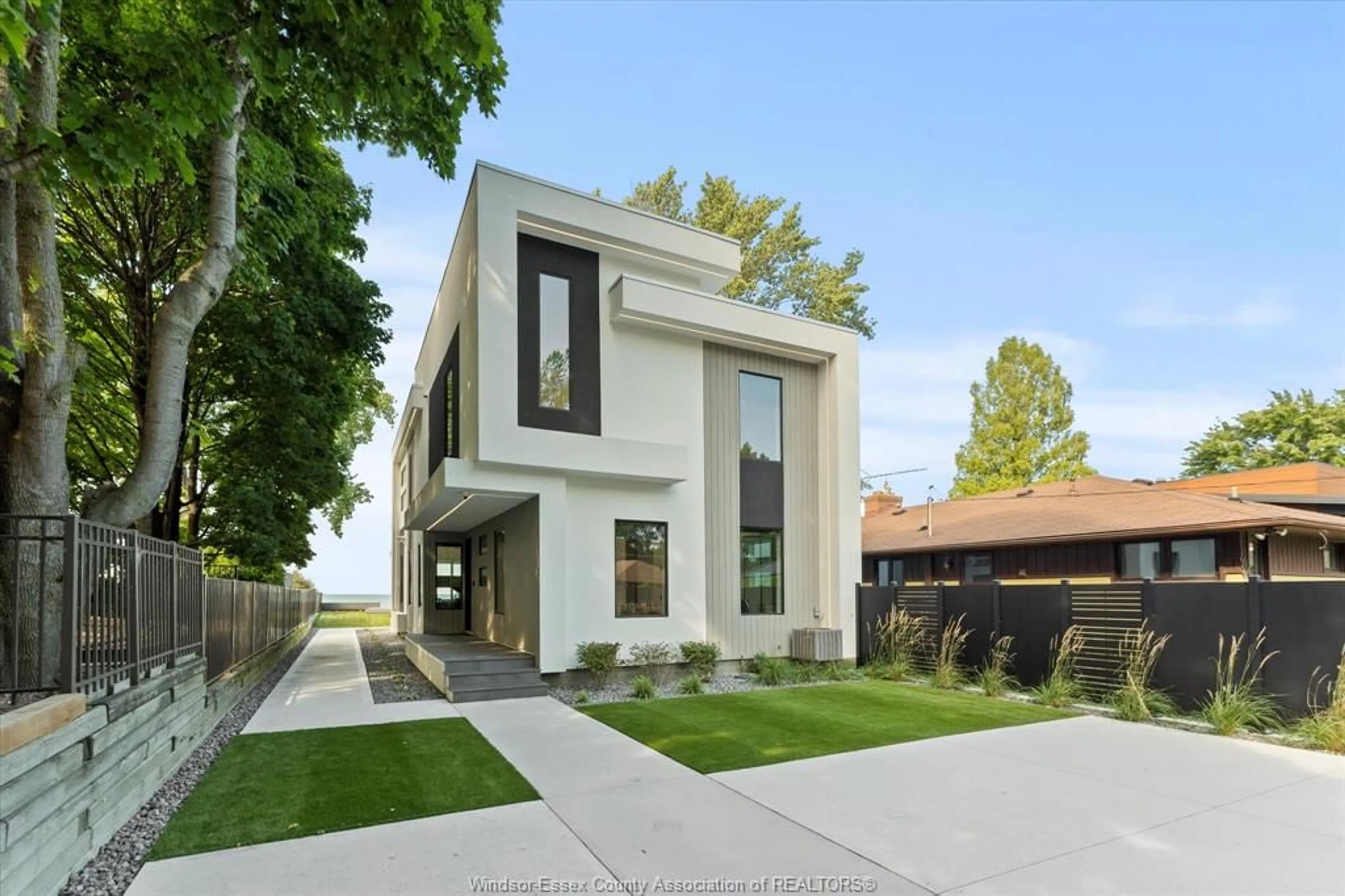 Home with brick exterior material, street for 754 OLD TECUMSEH Rd, Lakeshore Ontario N0R 1A0