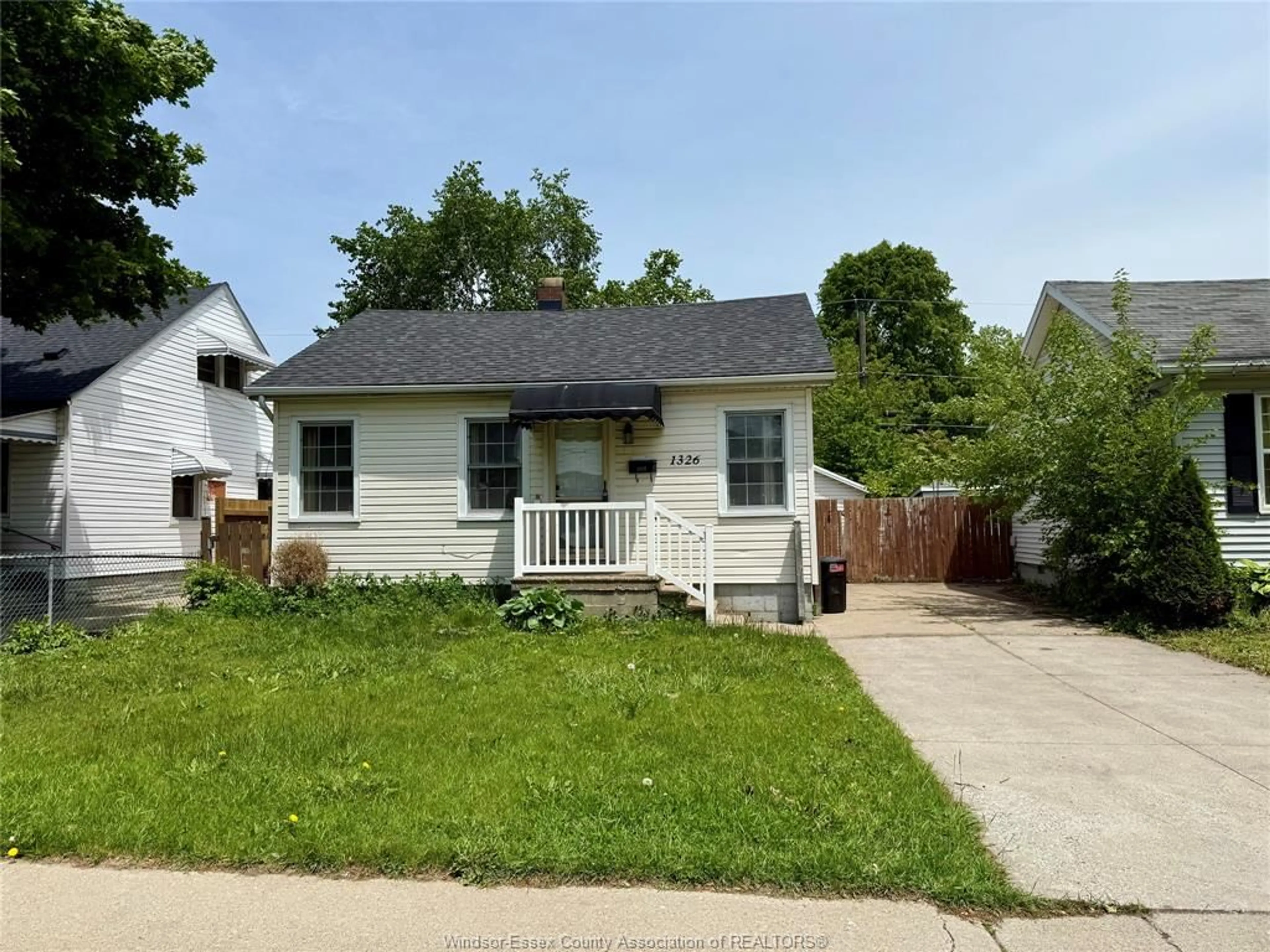 Home with vinyl exterior material, street for 1326 Central Ave, Windsor Ontario N8Y 3V4