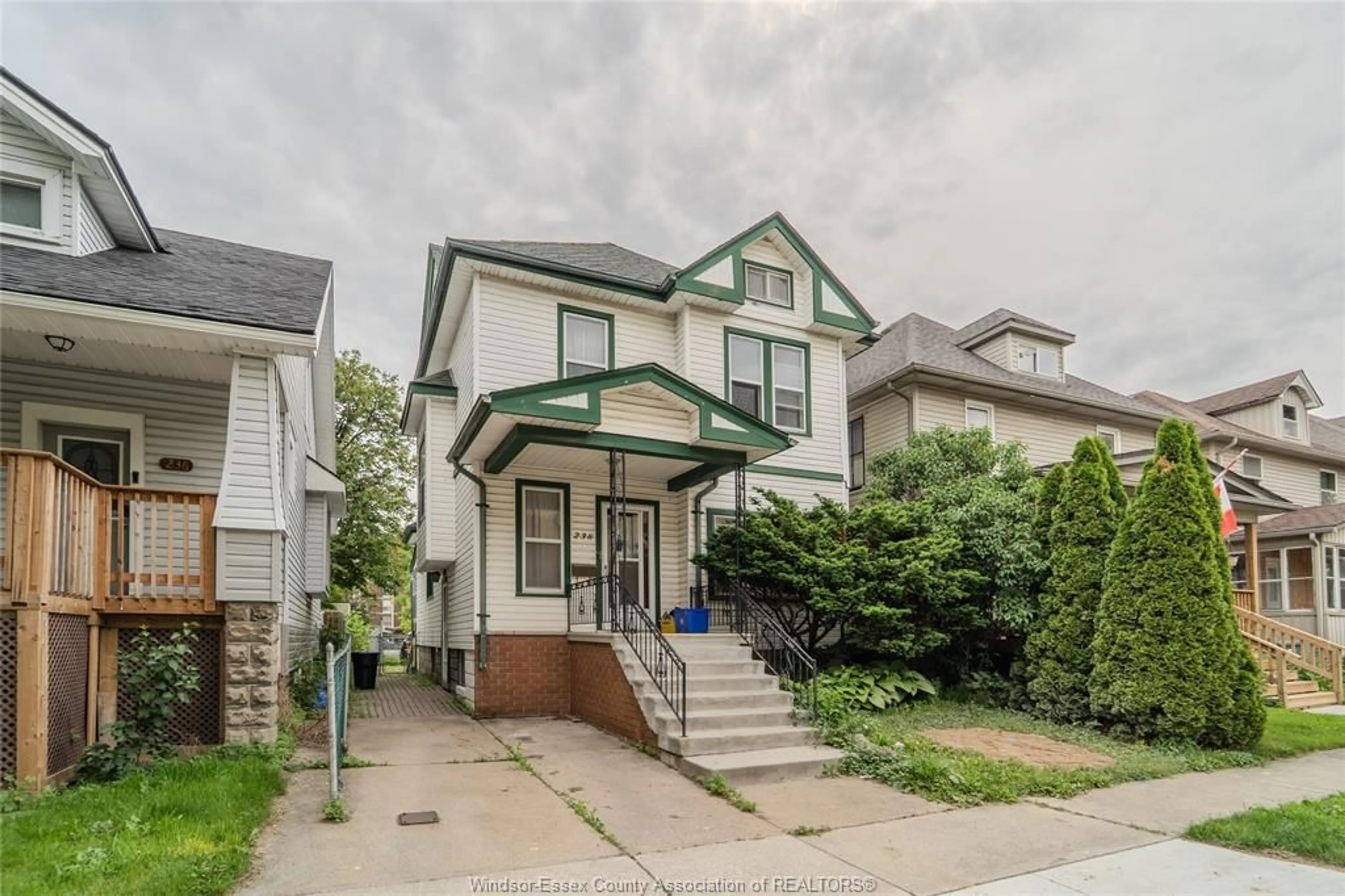 Home with vinyl exterior material, street for 238 Belleview Ave, Windsor Ontario N8Y 2V9
