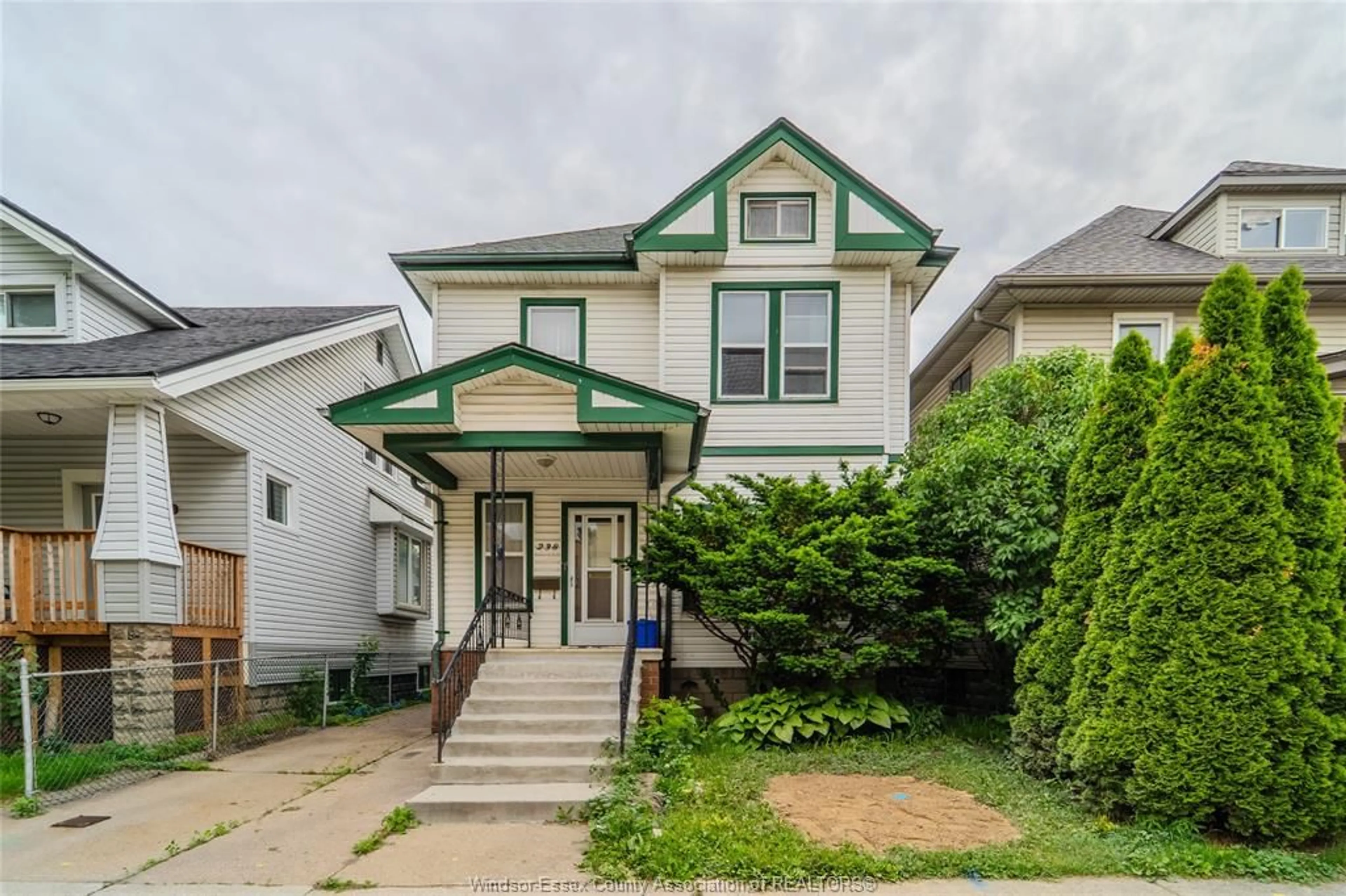 Home with vinyl exterior material, street for 238 Belleview Ave, Windsor Ontario N8Y 2V9