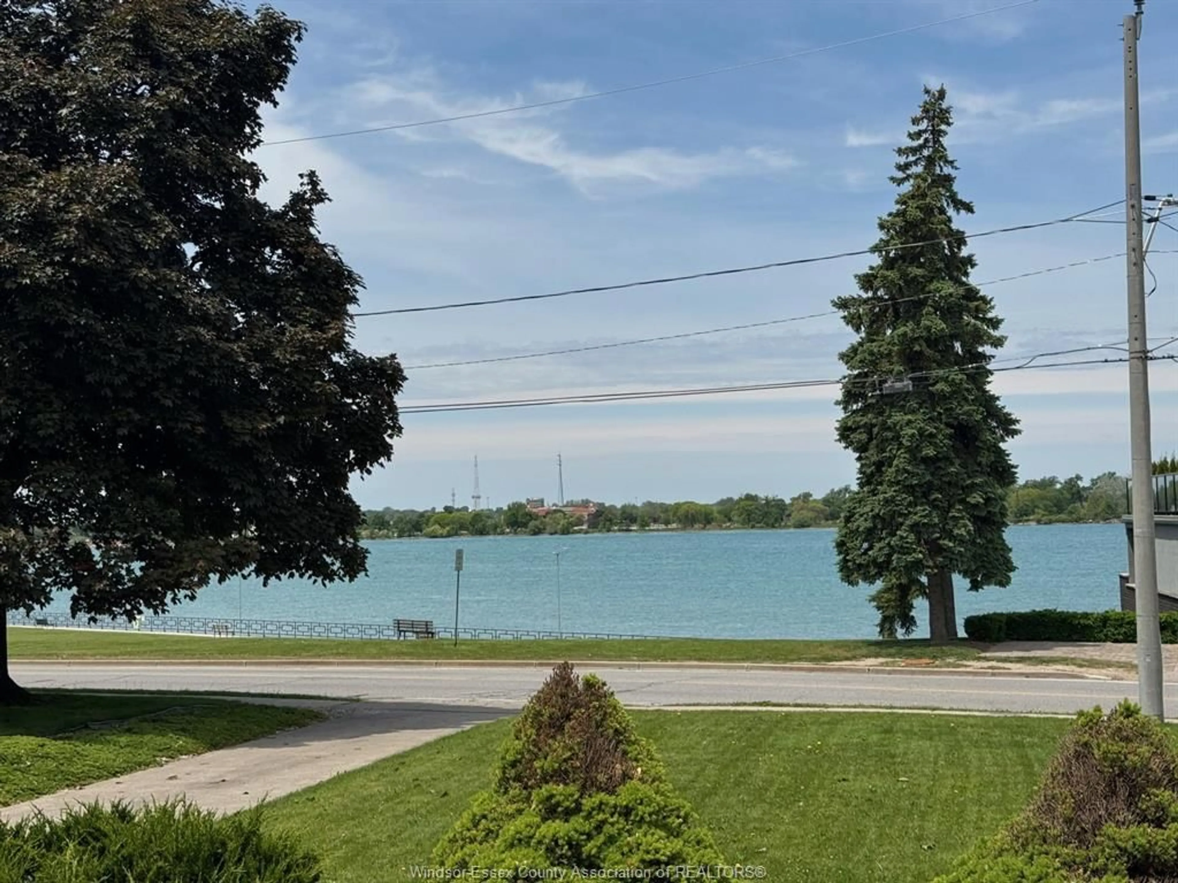 A pic from outside/outdoor area/front of a property/back of a property/a pic from drone, water/lake/river/ocean view for 4127 RIVERSIDE Dr, Windsor Ontario N8Y 1B4