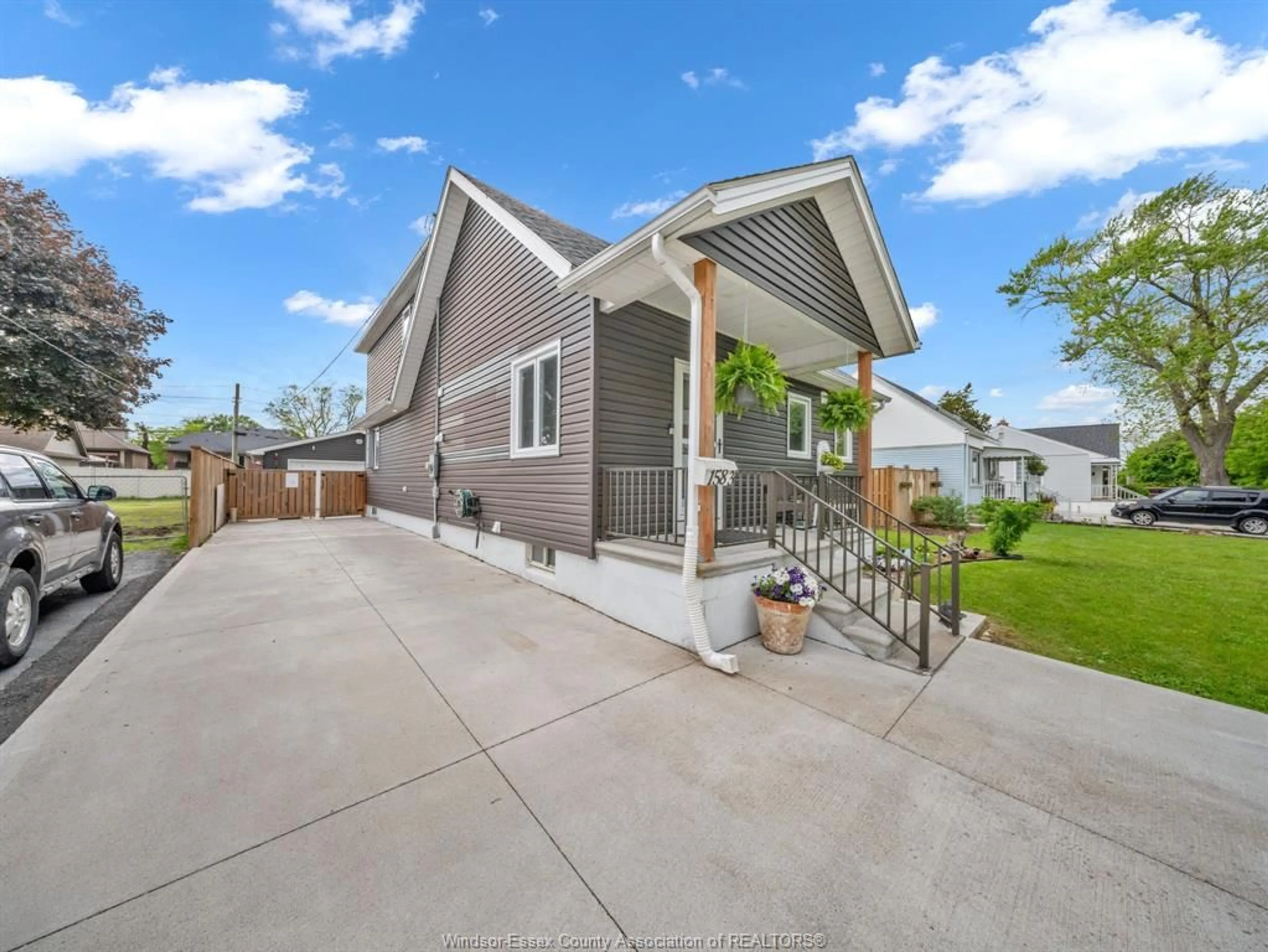 Home with vinyl exterior material, street for 1583 Bernard Rd, Windsor Ontario N8Y 4K5