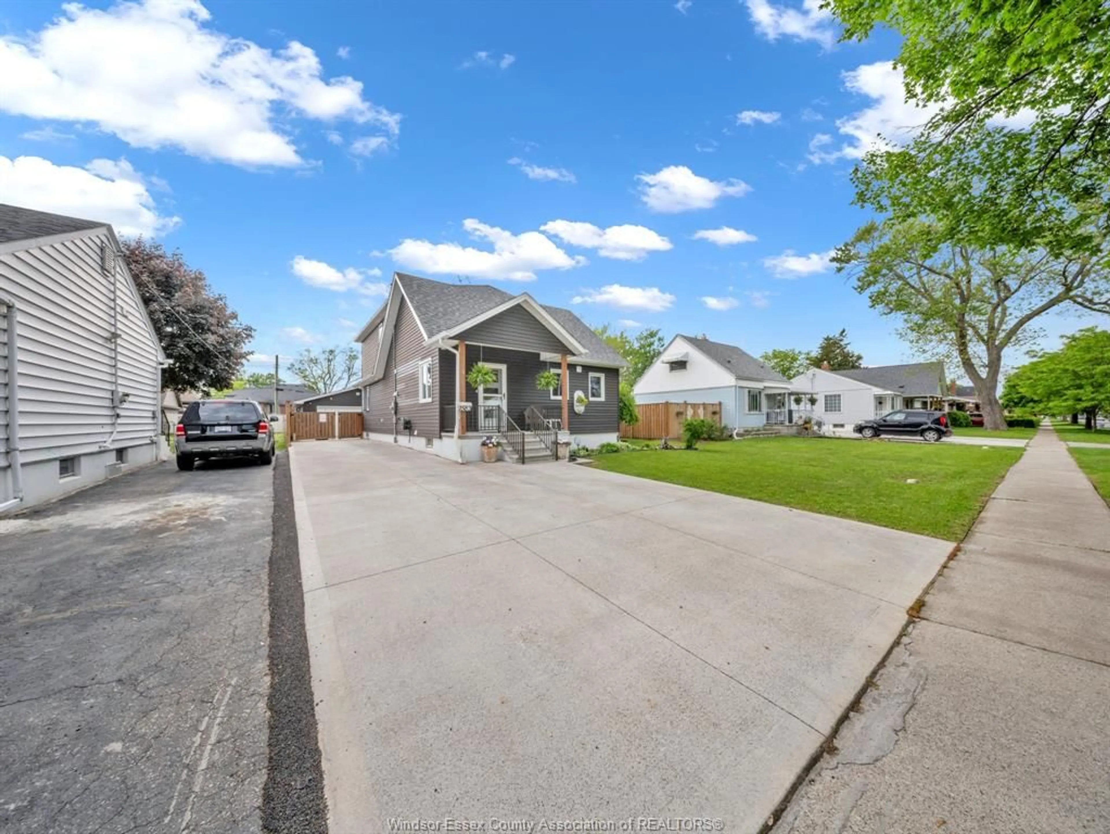 A pic from outside/outdoor area/front of a property/back of a property/a pic from drone, street for 1583 Bernard Rd, Windsor Ontario N8Y 4K5