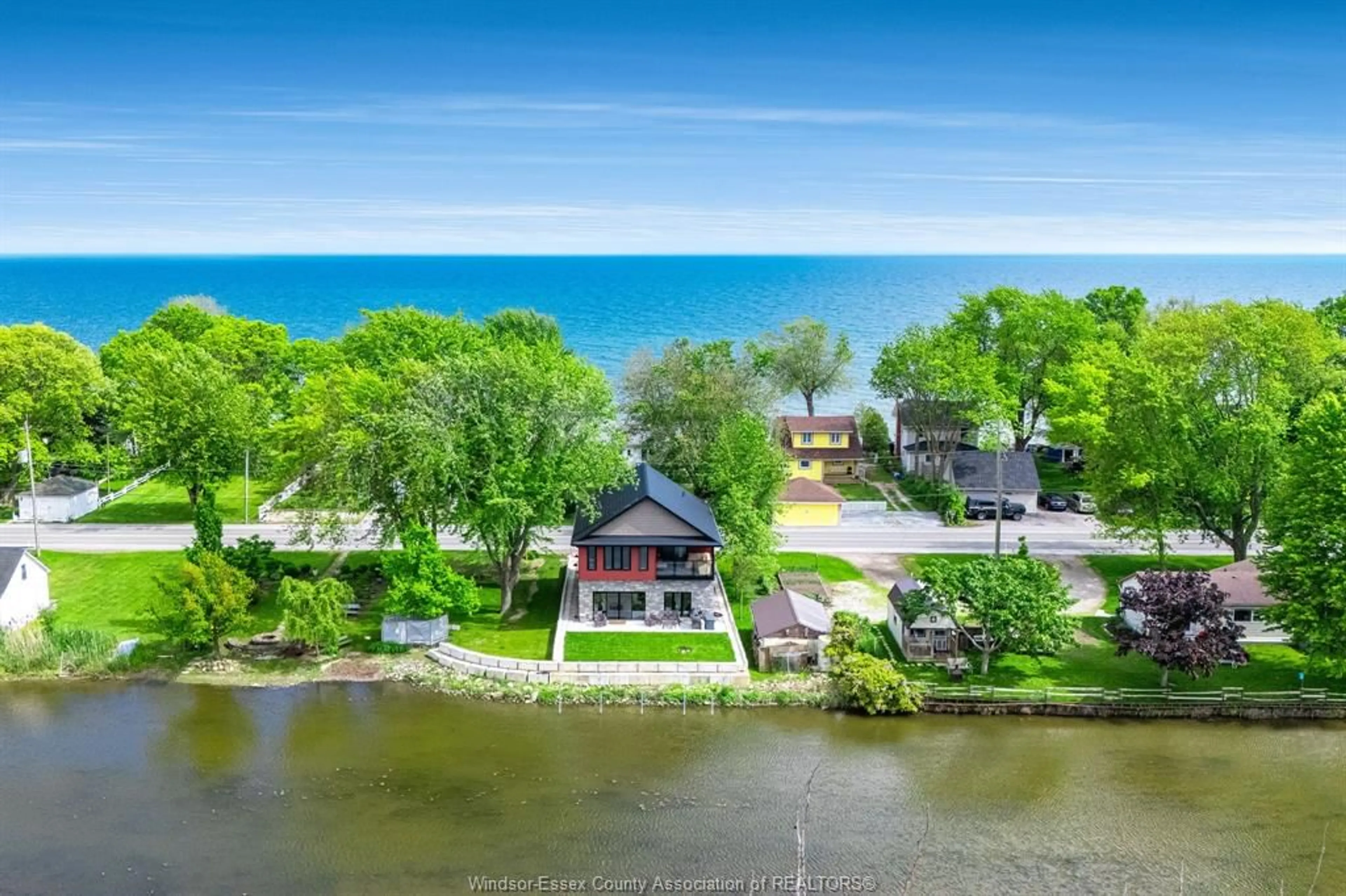A pic from outside/outdoor area/front of a property/back of a property/a pic from drone, water/lake/river/ocean view for 1260 Heritage Rd, Kingsville Ontario N9Y 2E6
