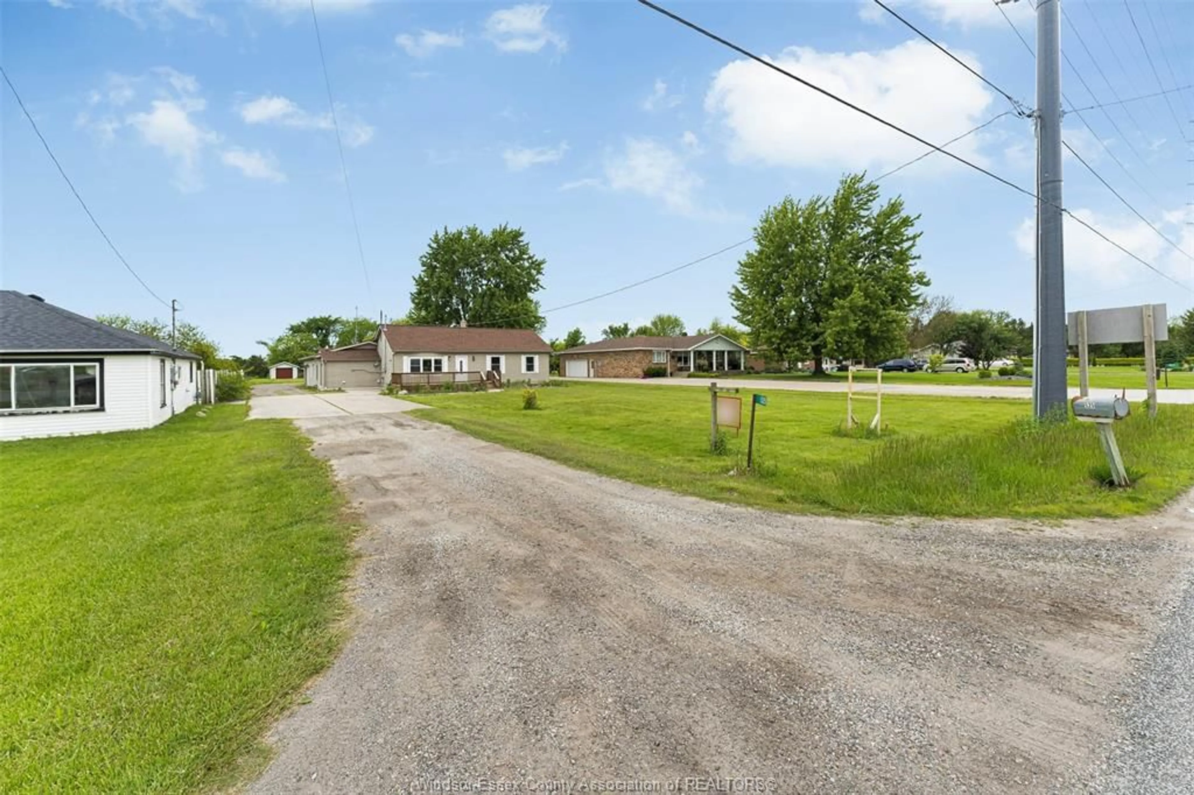 A pic from outside/outdoor area/front of a property/back of a property/a pic from drone, street for 525 HIGHWAY 77, Leamington Ontario N8H 3V8