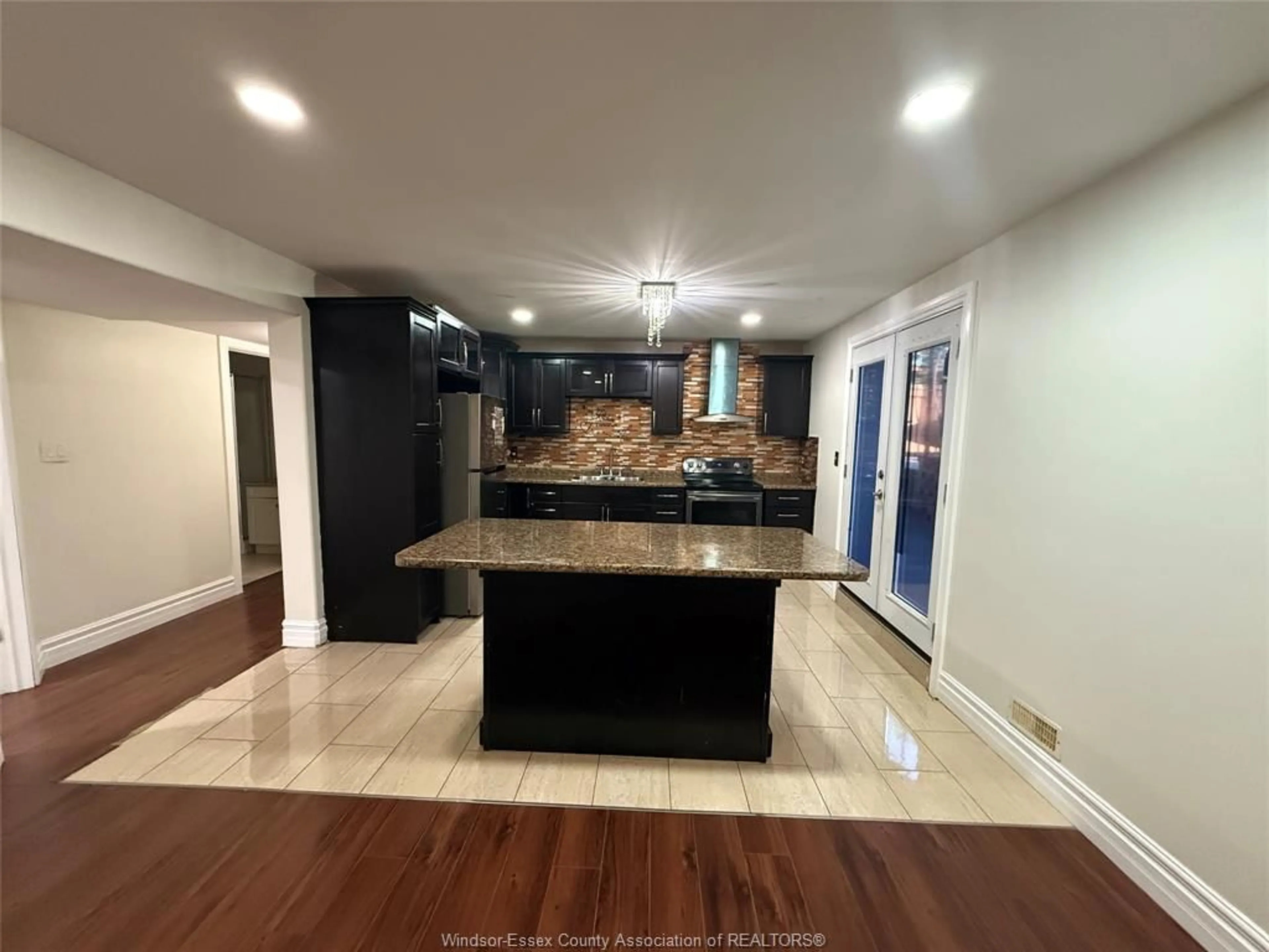Open concept kitchen, ceramic/tile floor for 733 MASSIMO Cres, Windsor Ontario N9G 3C7