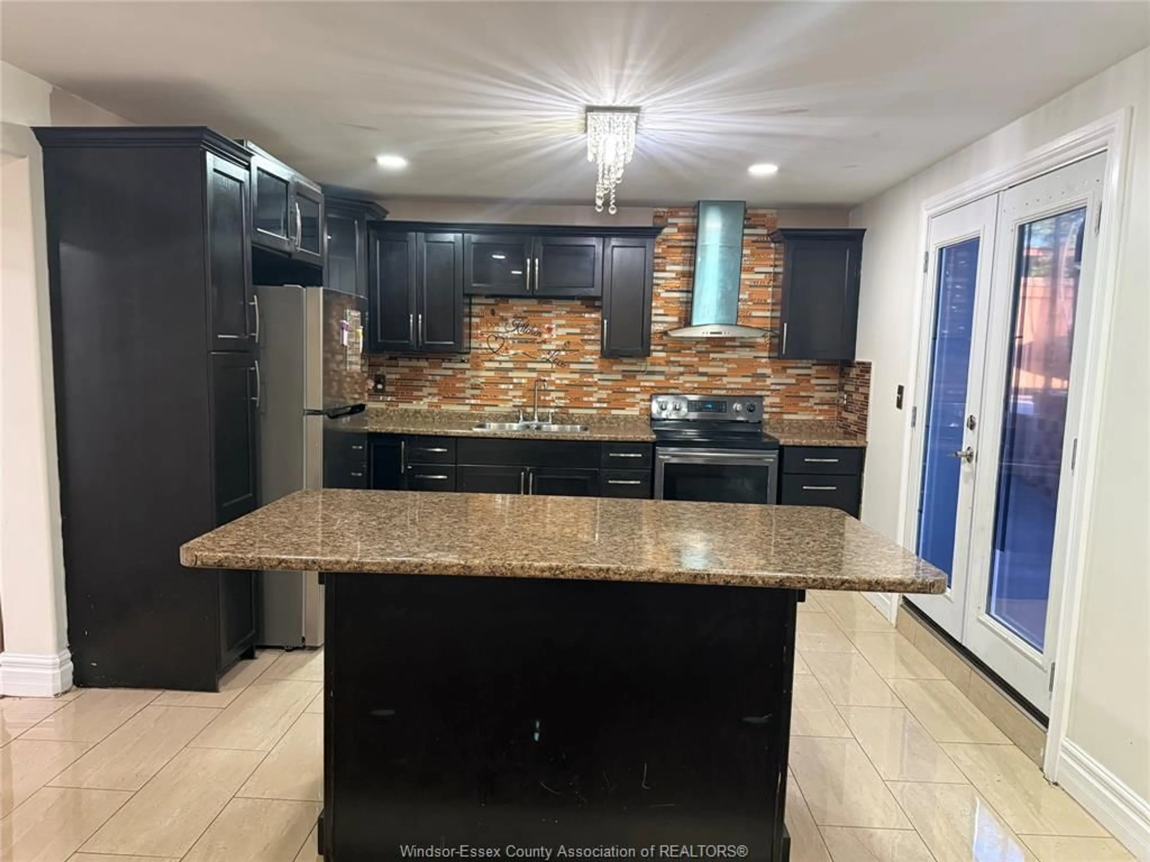 Open concept kitchen, ceramic/tile floor for 733 MASSIMO Cres, Windsor Ontario N9G 3C7