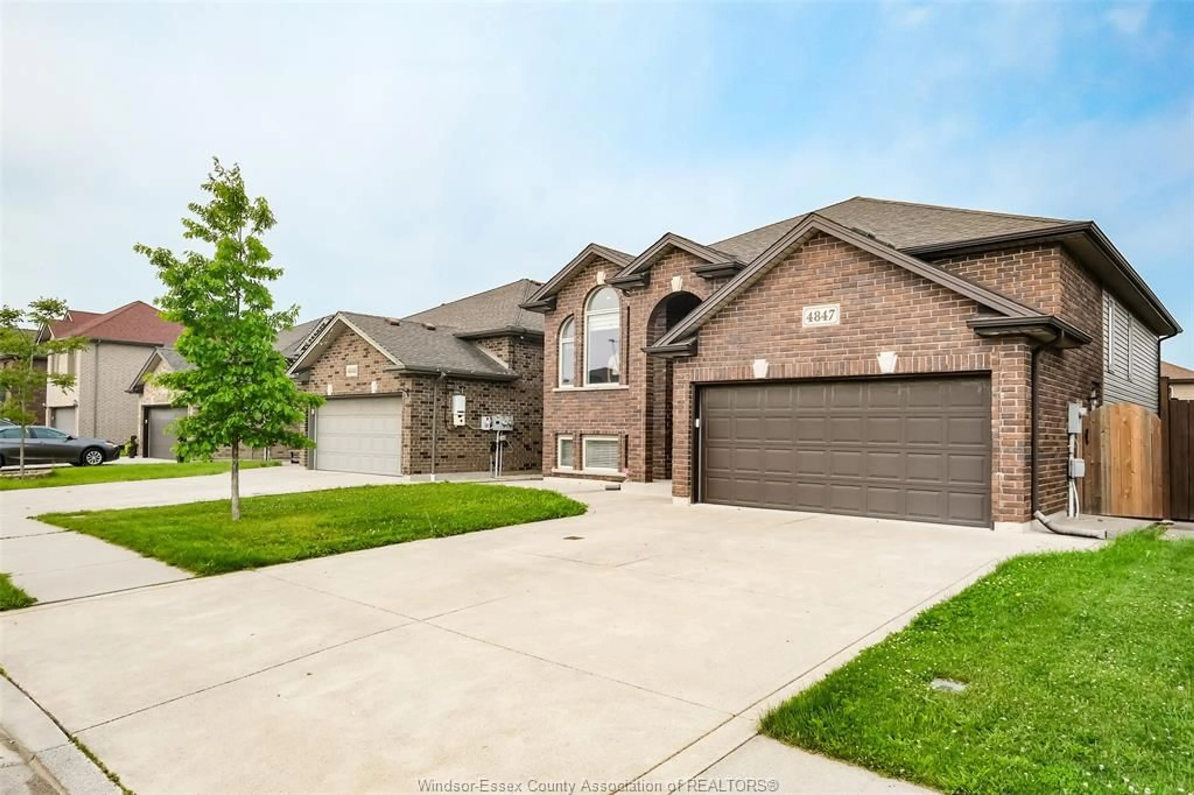 Home with brick exterior material, street for 4847 PERIWINKLE Cres, Windsor Ontario N9G 3G8
