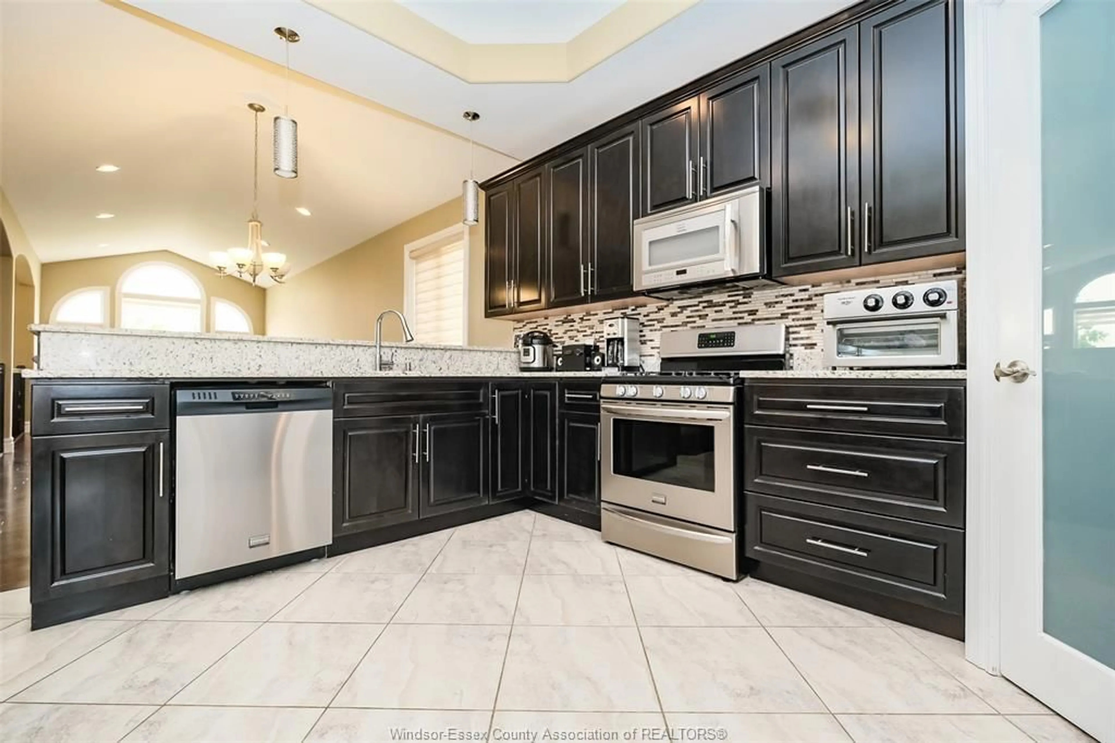Open concept kitchen, ceramic/tile floor for 4847 PERIWINKLE Cres, Windsor Ontario N9G 3G8