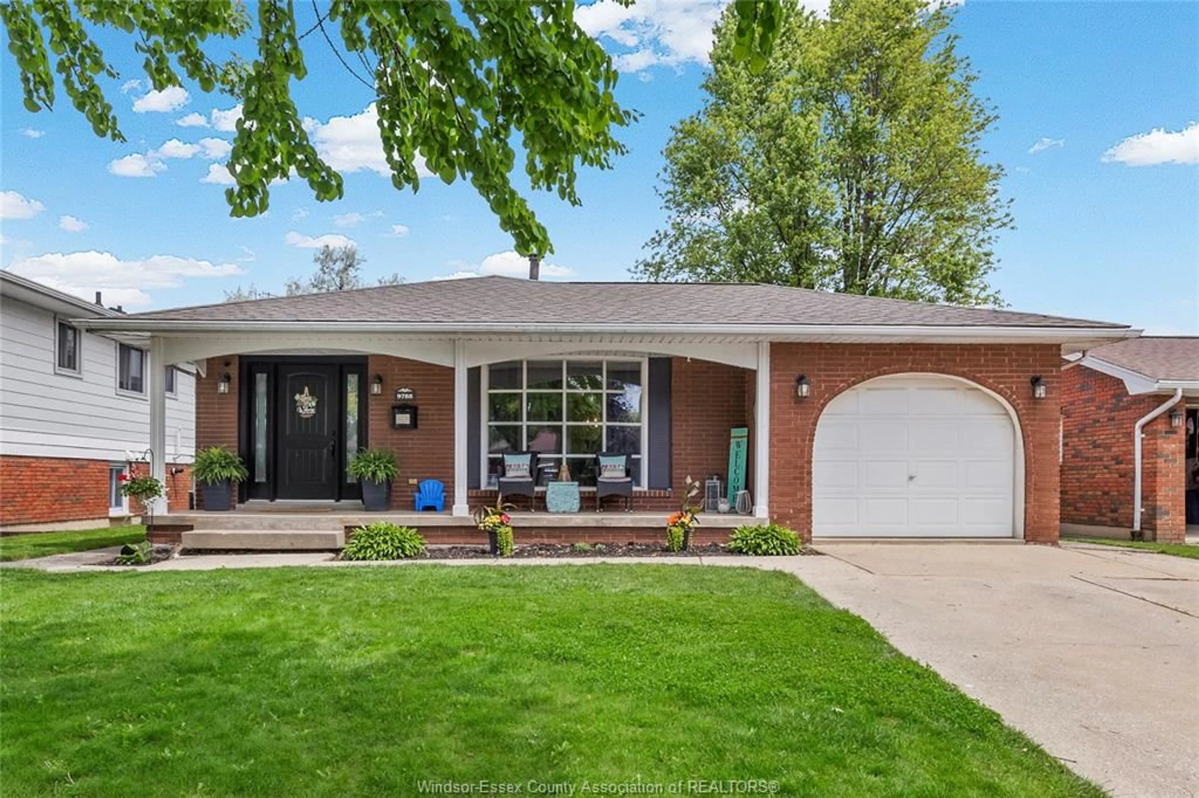 Home with brick exterior material, street for 9788 OSBORN Cres, Windsor Ontario N8R 1G3