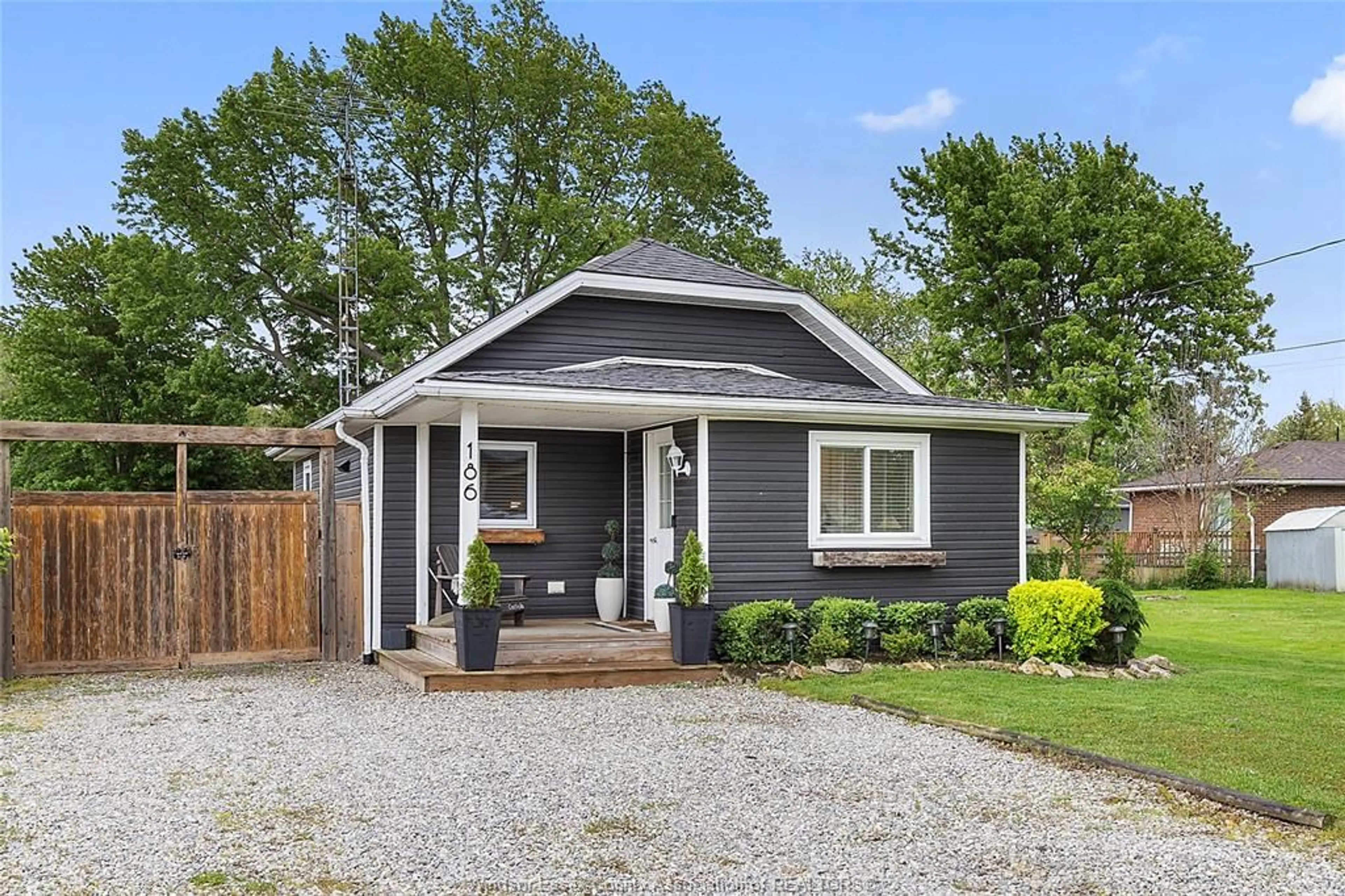 Home with vinyl exterior material, street for 186 EAST PUCE Rd, Lakeshore Ontario N0R 1A0