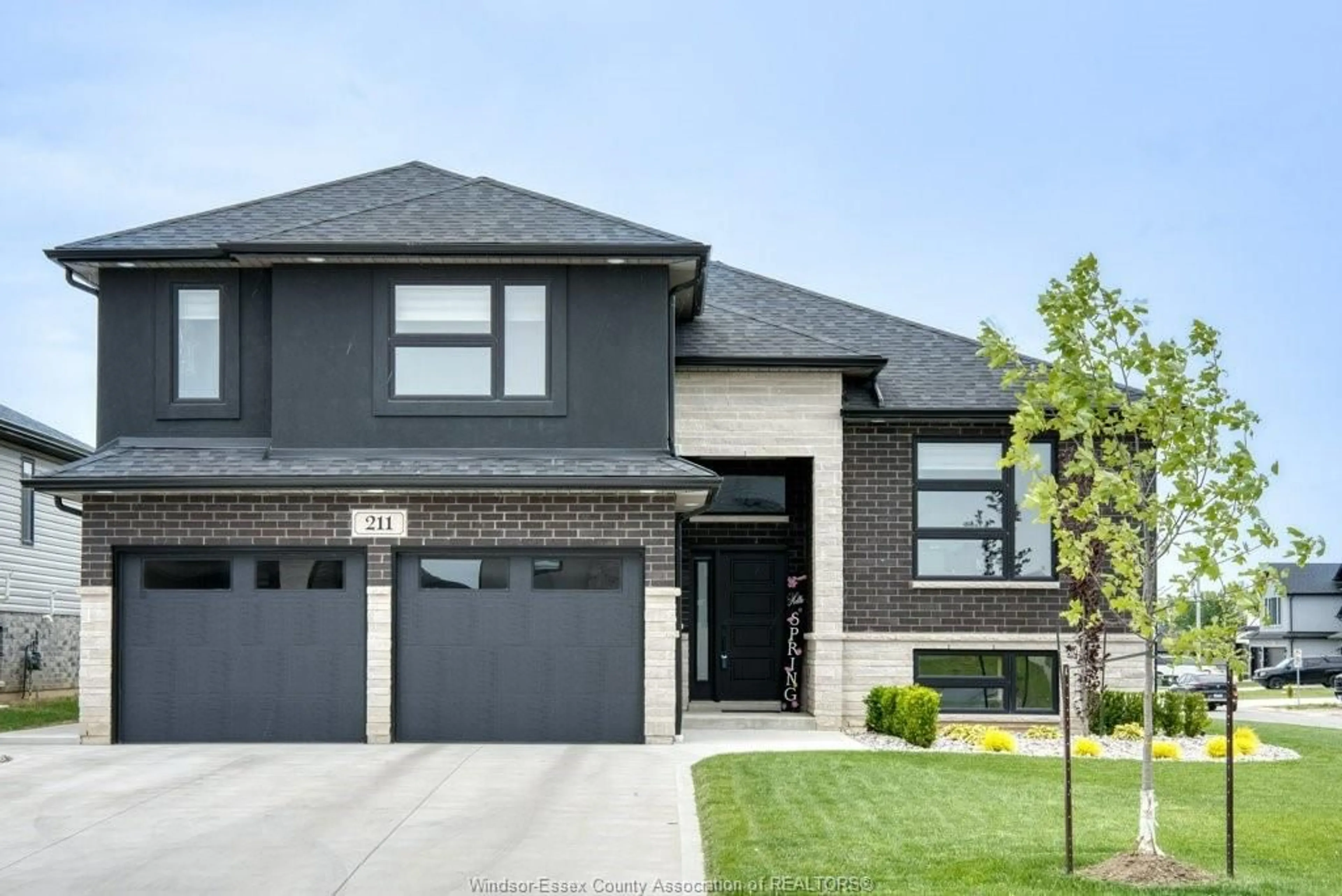 Home with brick exterior material, street for 211 Bartlett Rd, Amherstburg Ontario N9V 0G8