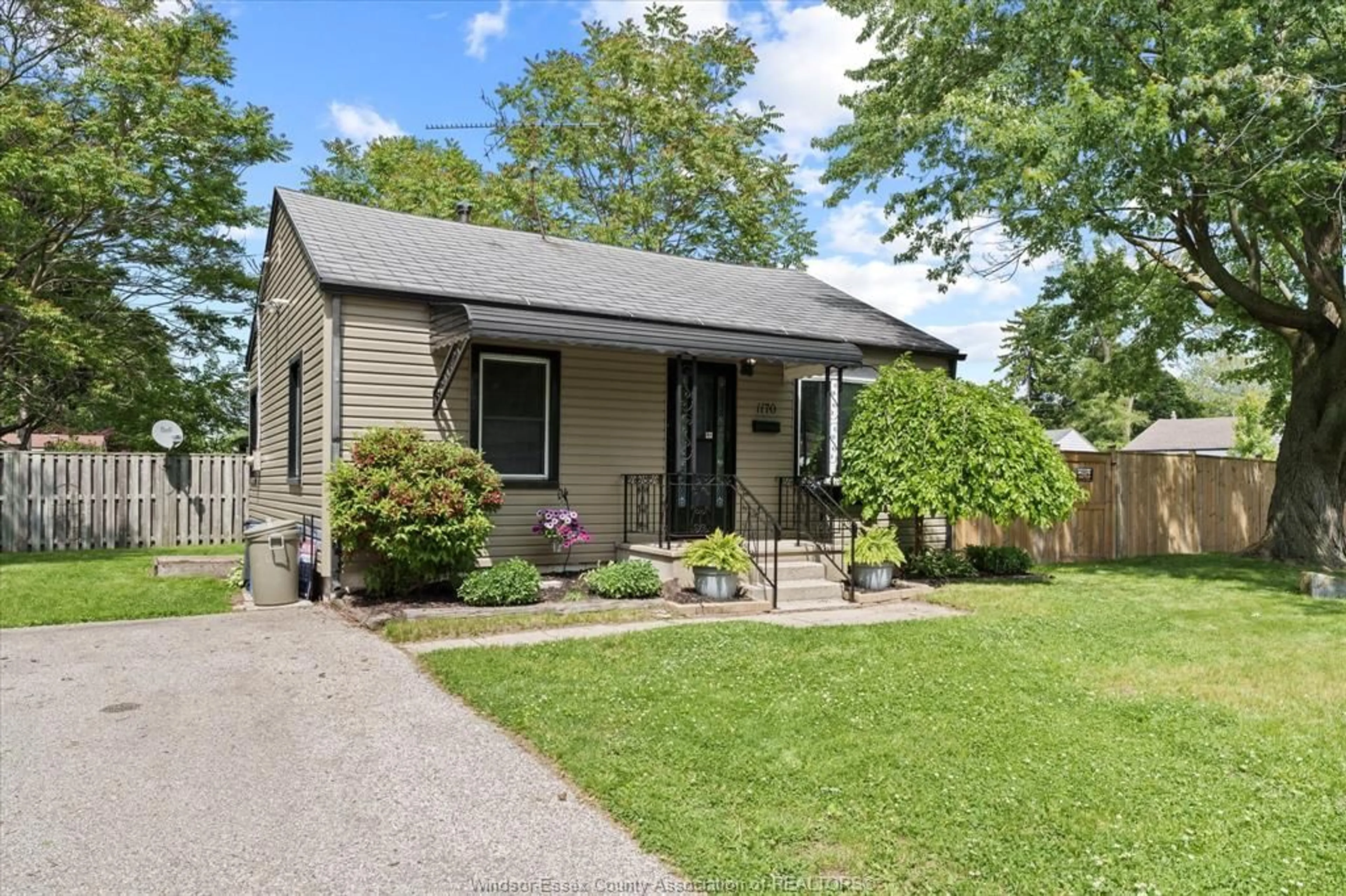Home with vinyl exterior material, street for 1170 STRATHMORE Ave, Windsor Ontario N9C 3N5