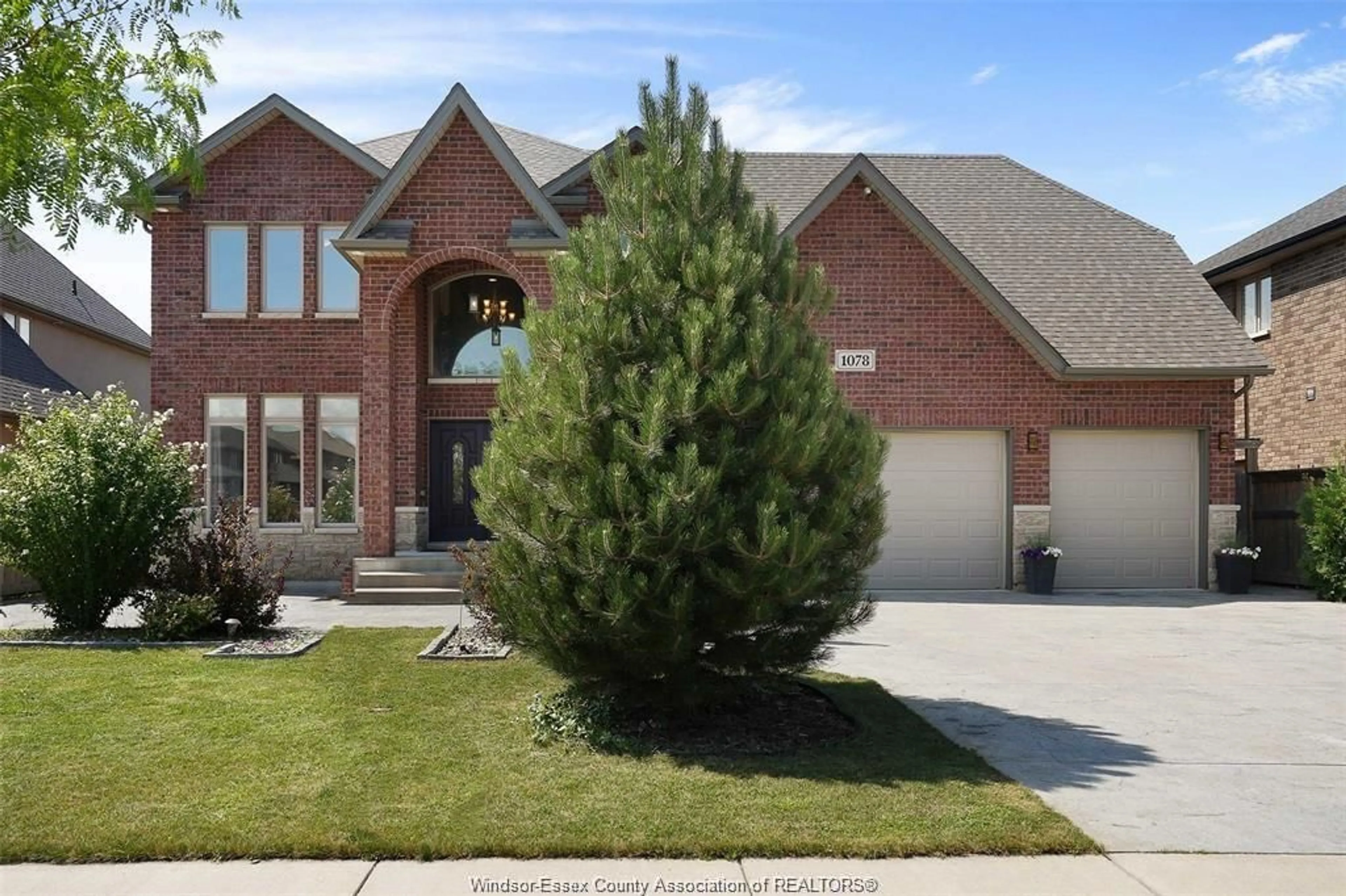 Home with brick exterior material, street for 1078 CHARLOTTE Cres, Lakeshore Ontario N0R 1A0