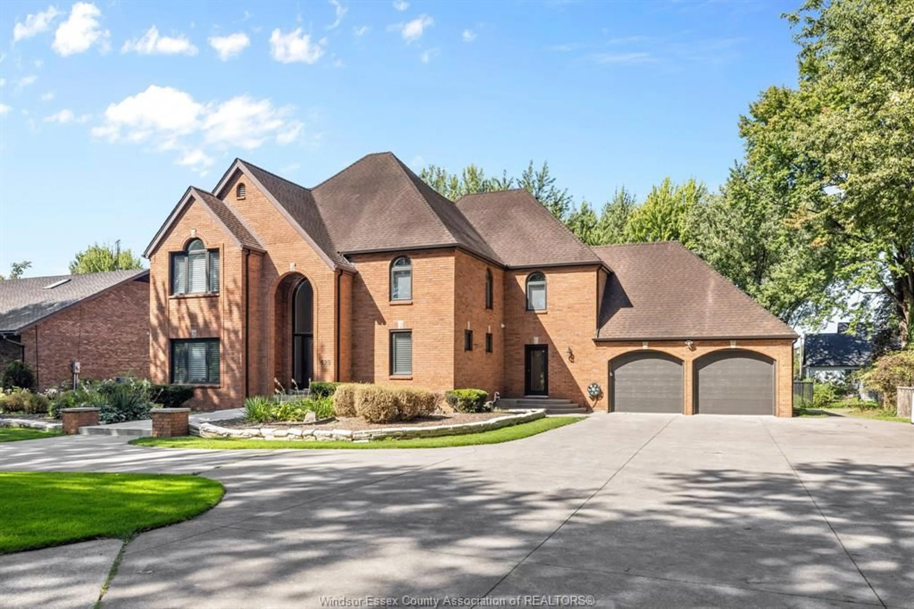 Home with brick exterior material, street for 428 OLD TECUMSEH Rd, Lakeshore Ontario N8N 3S8
