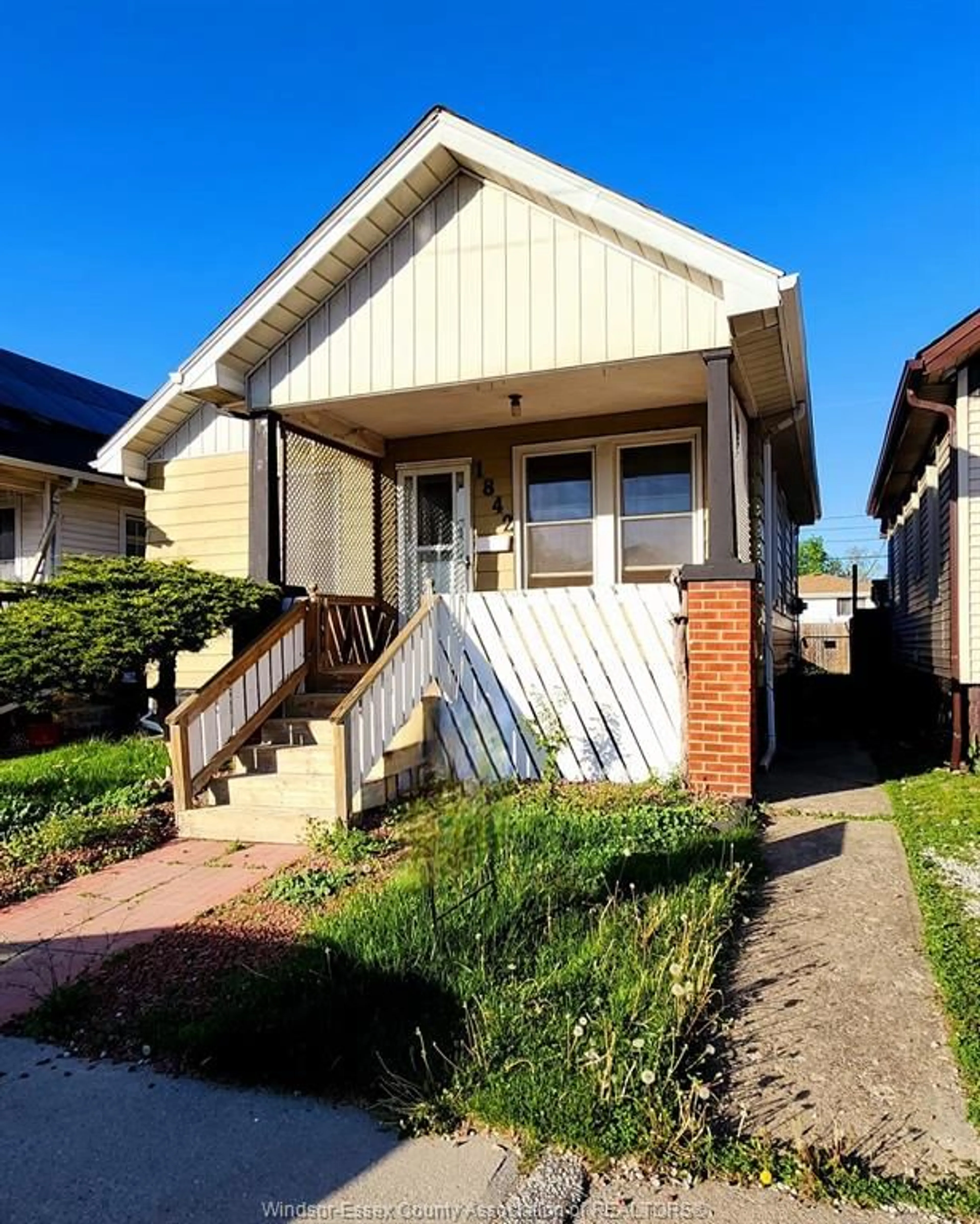 Home with vinyl exterior material, street for 1842 DROUILLARD, Windsor Ontario N8W 3X5