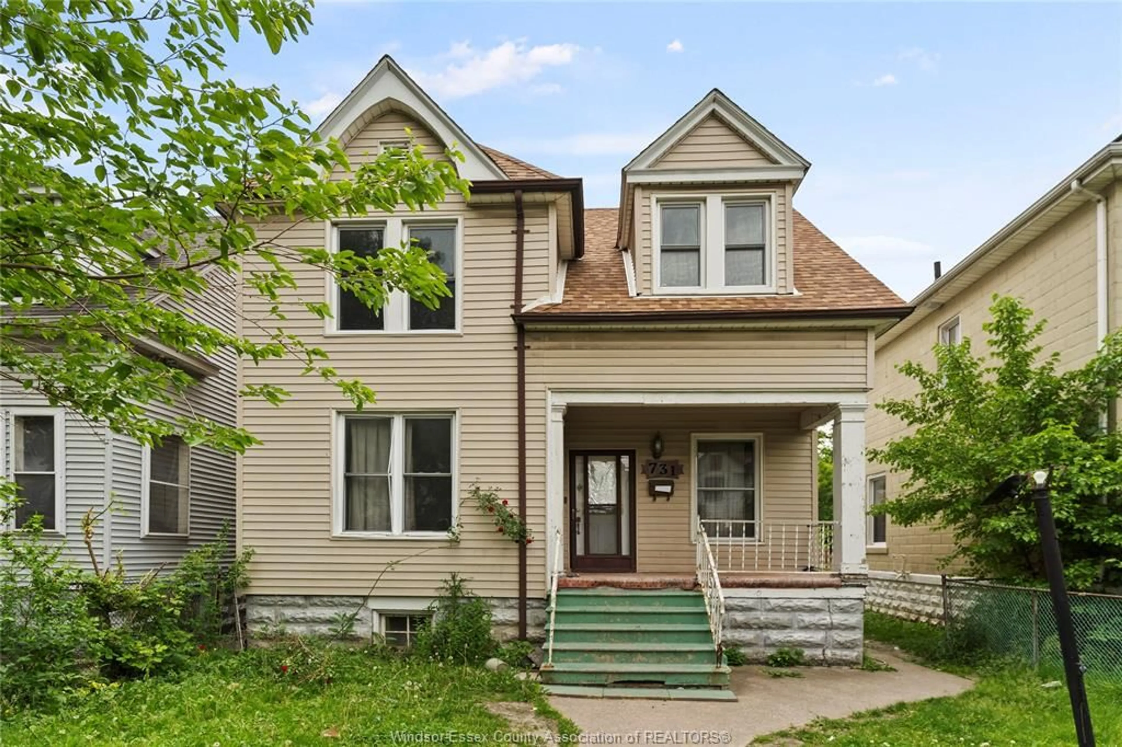Home with brick exterior material, street for 731 Dougall Ave, Windsor Ontario N9A 4P9