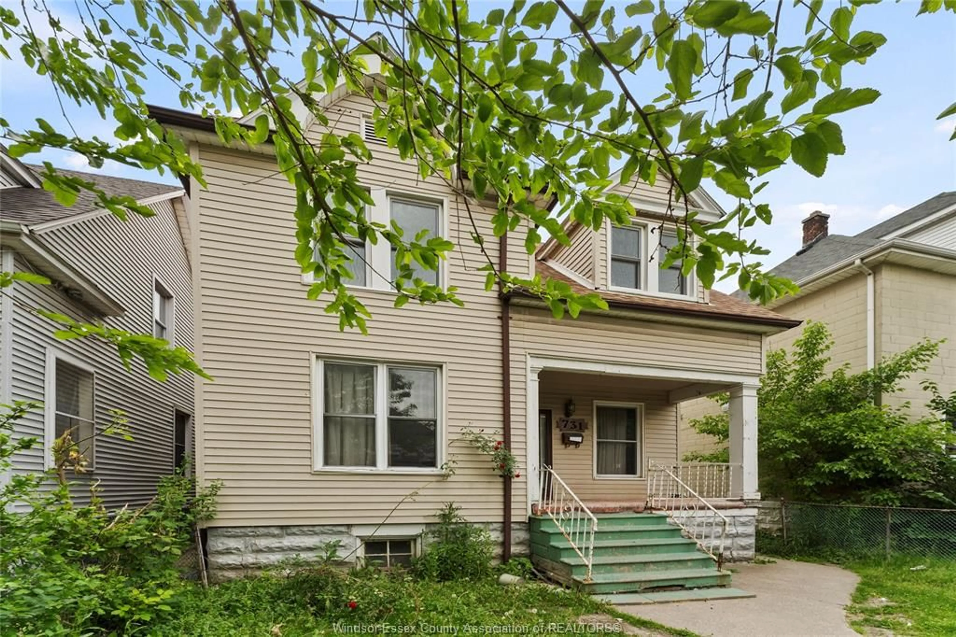 Home with brick exterior material, street for 731 Dougall Ave, Windsor Ontario N9A 4P9