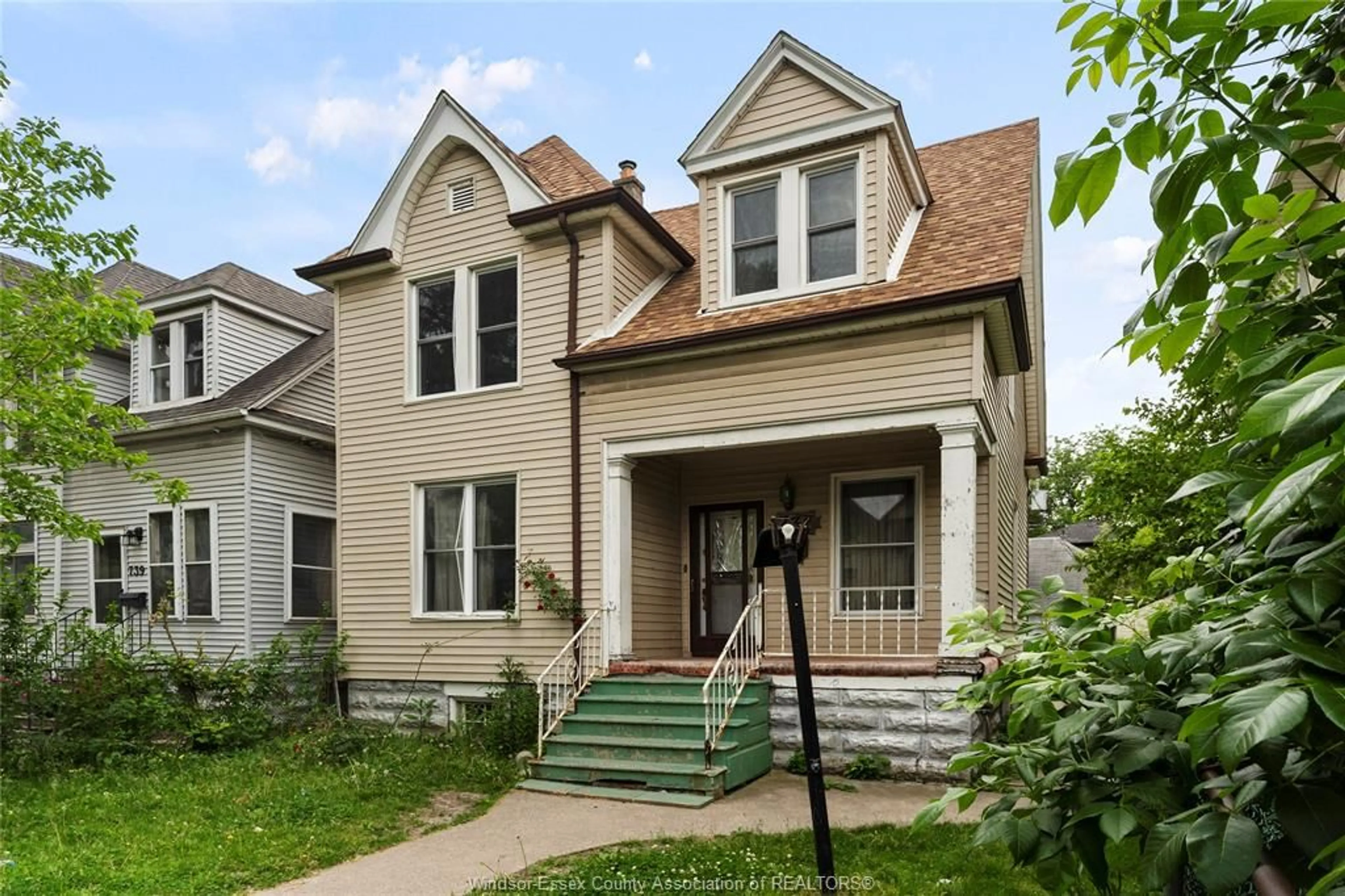 Home with brick exterior material, street for 731 Dougall Ave, Windsor Ontario N9A 4P9