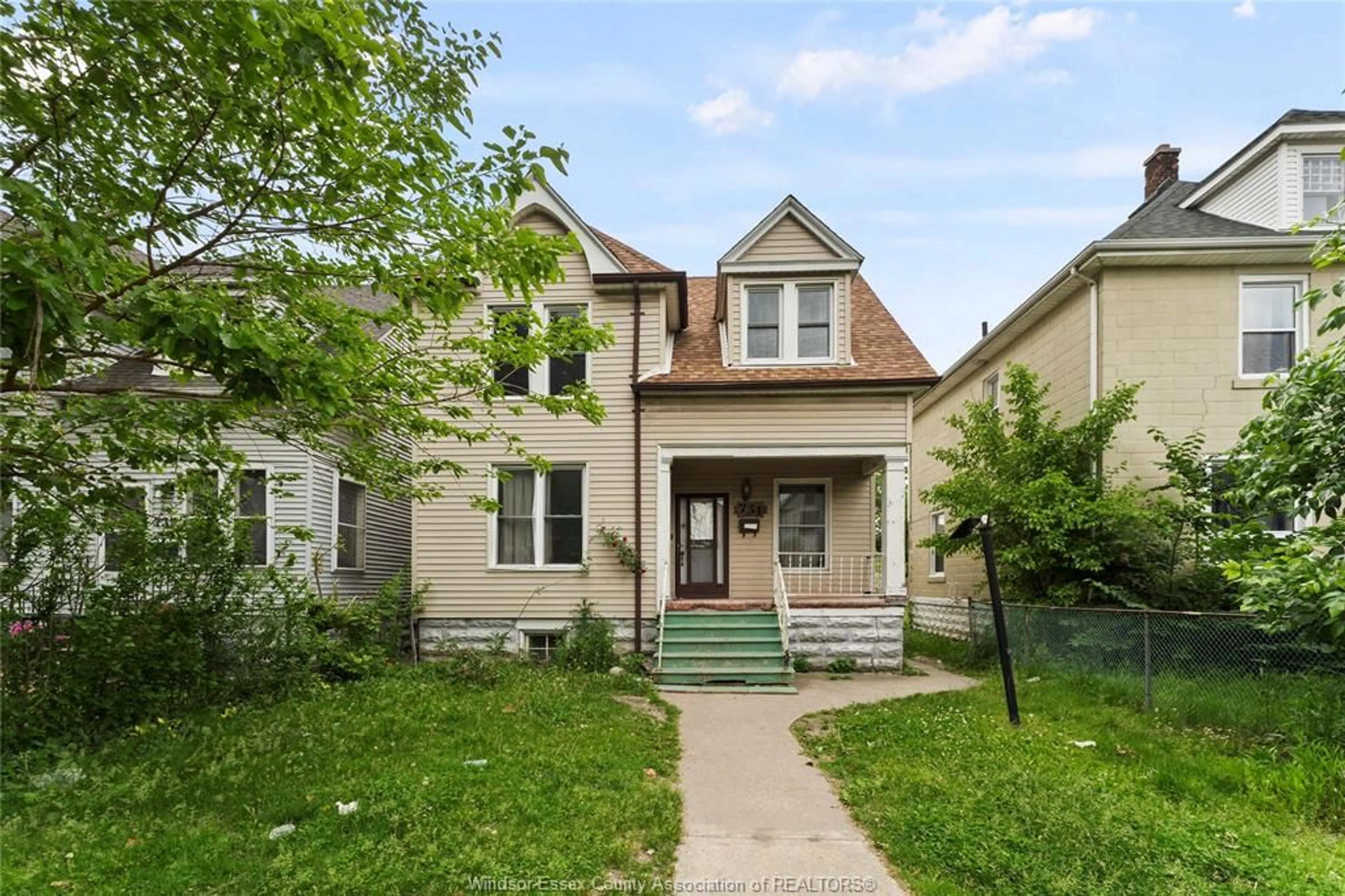 Home with brick exterior material, street for 731 Dougall Ave, Windsor Ontario N9A 4P9