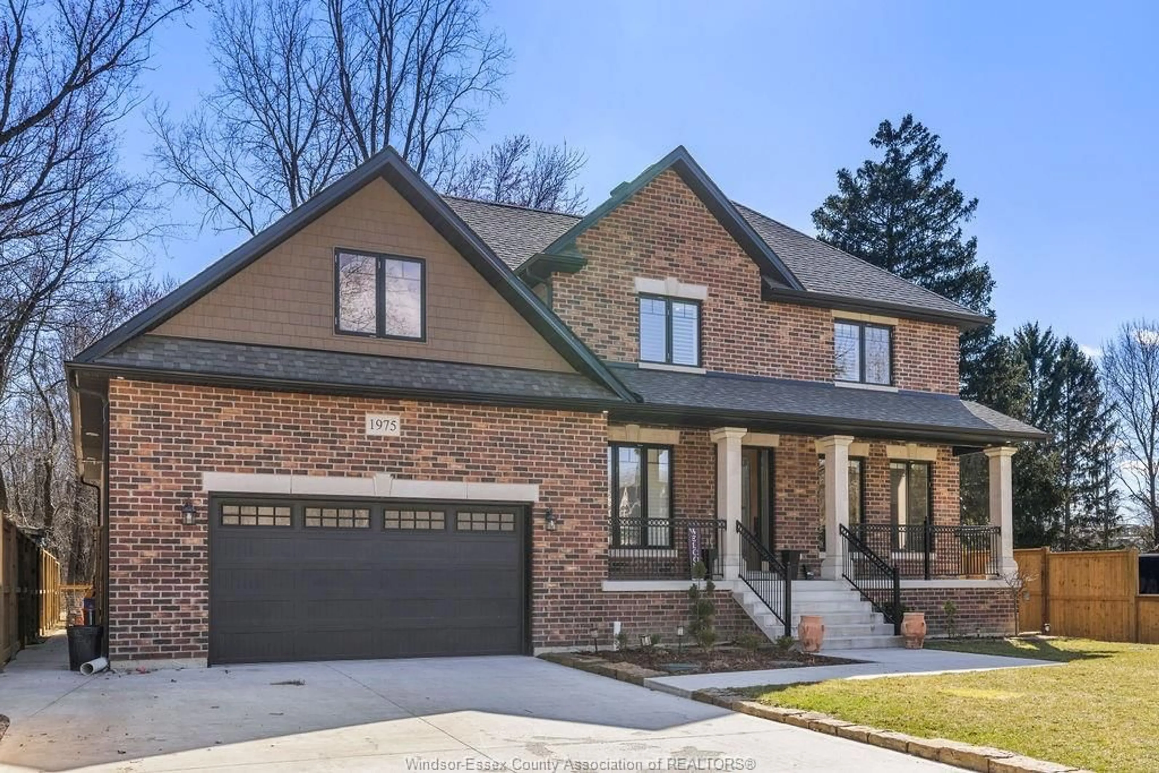 Home with brick exterior material, street for 1975 LANSING St, Windsor Ontario N9E 3S4