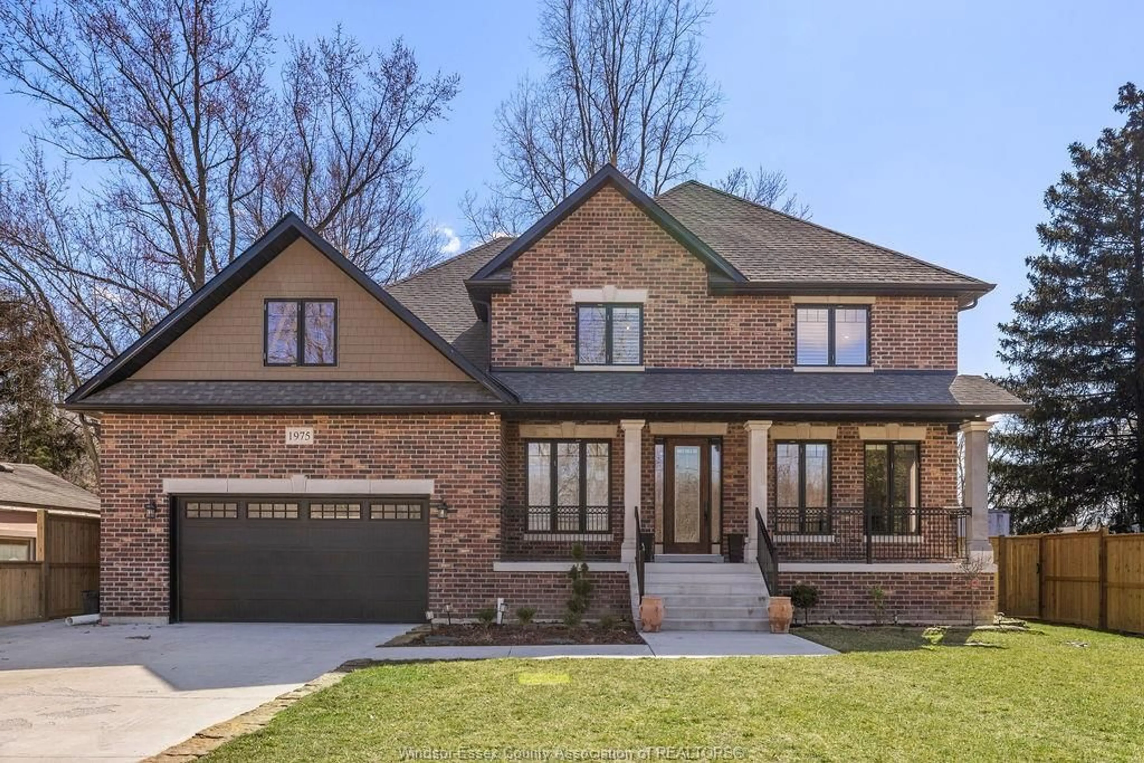 Home with brick exterior material, street for 1975 LANSING St, Windsor Ontario N9E 3S4