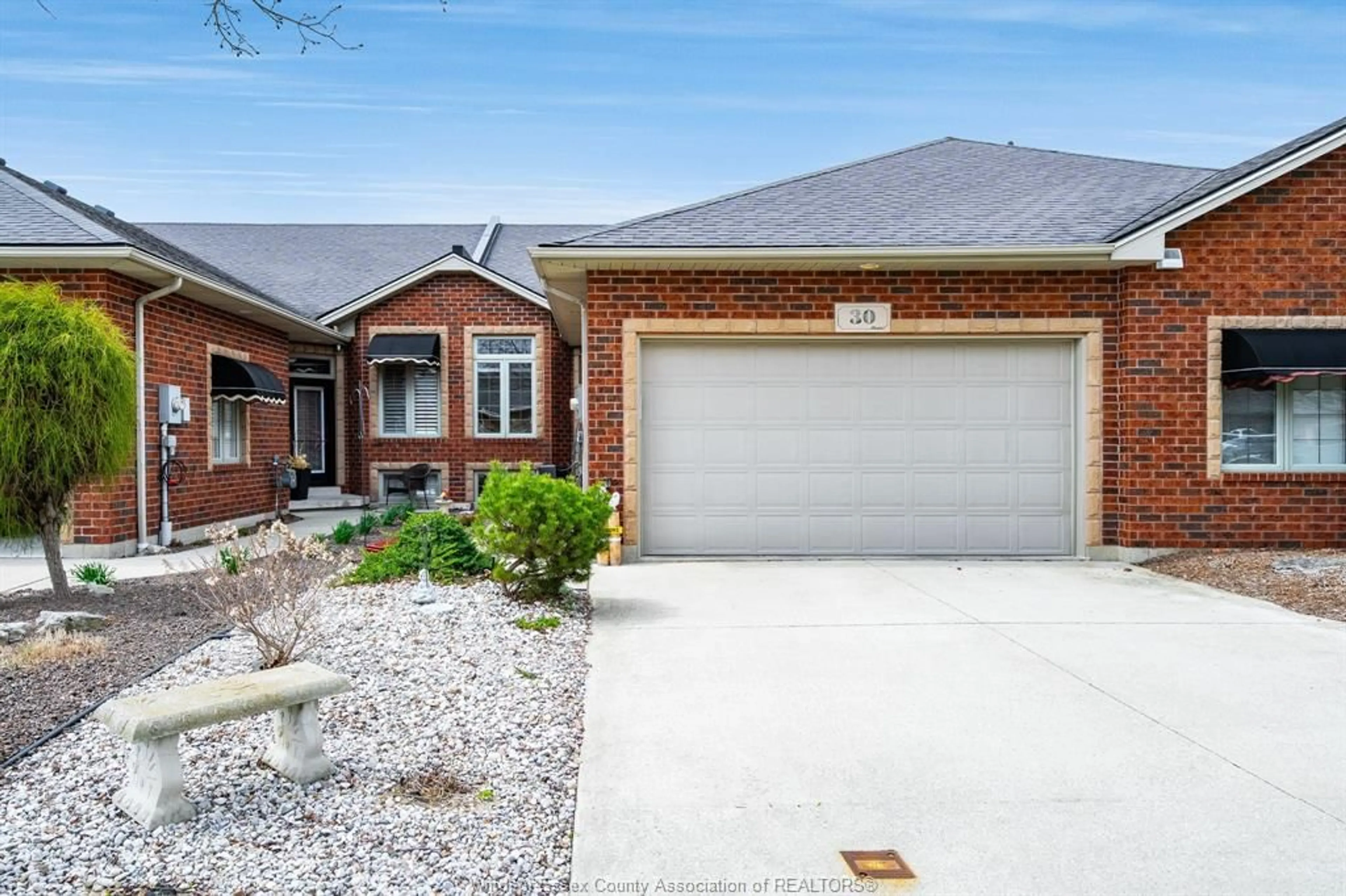 Home with brick exterior material, street for 30 Leonard Dr, Kingsville Ontario N9Y 4G4
