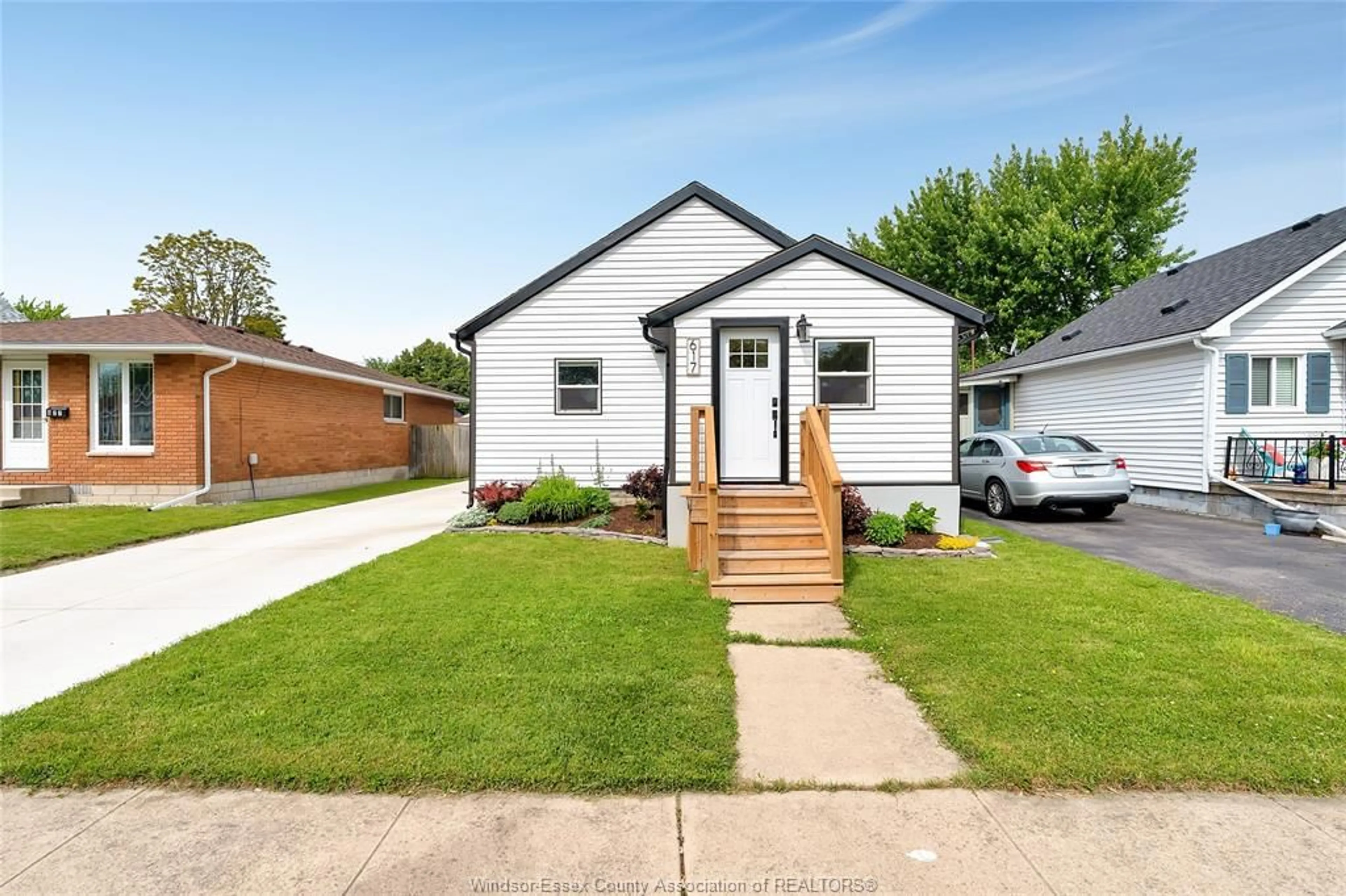 Home with brick exterior material, street for 617 Labute St, Tecumseh Ontario N8N 2B2