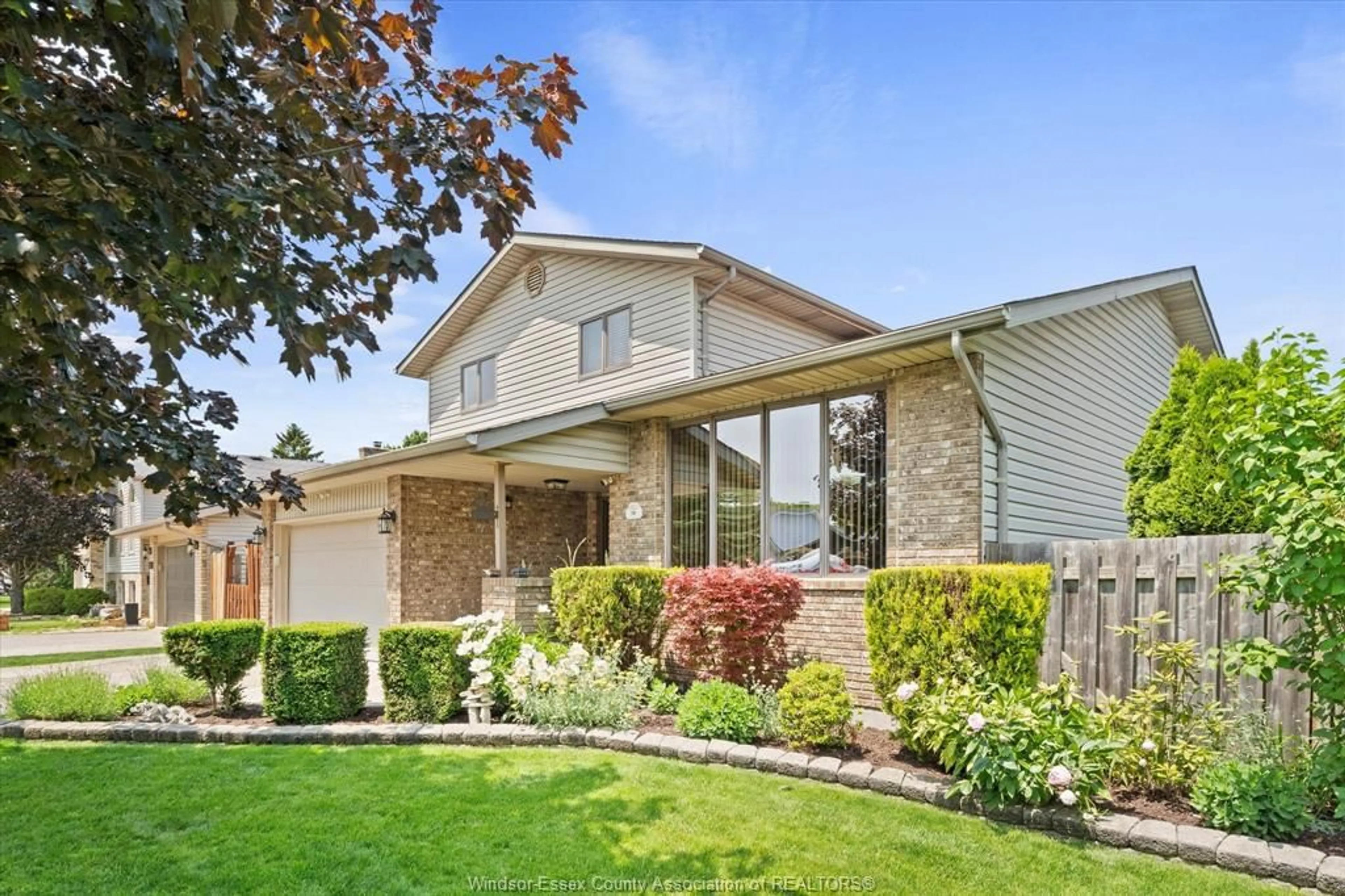 Home with vinyl exterior material, street for 241 MELANIE Lane, Lakeshore Ontario N0R 1A0