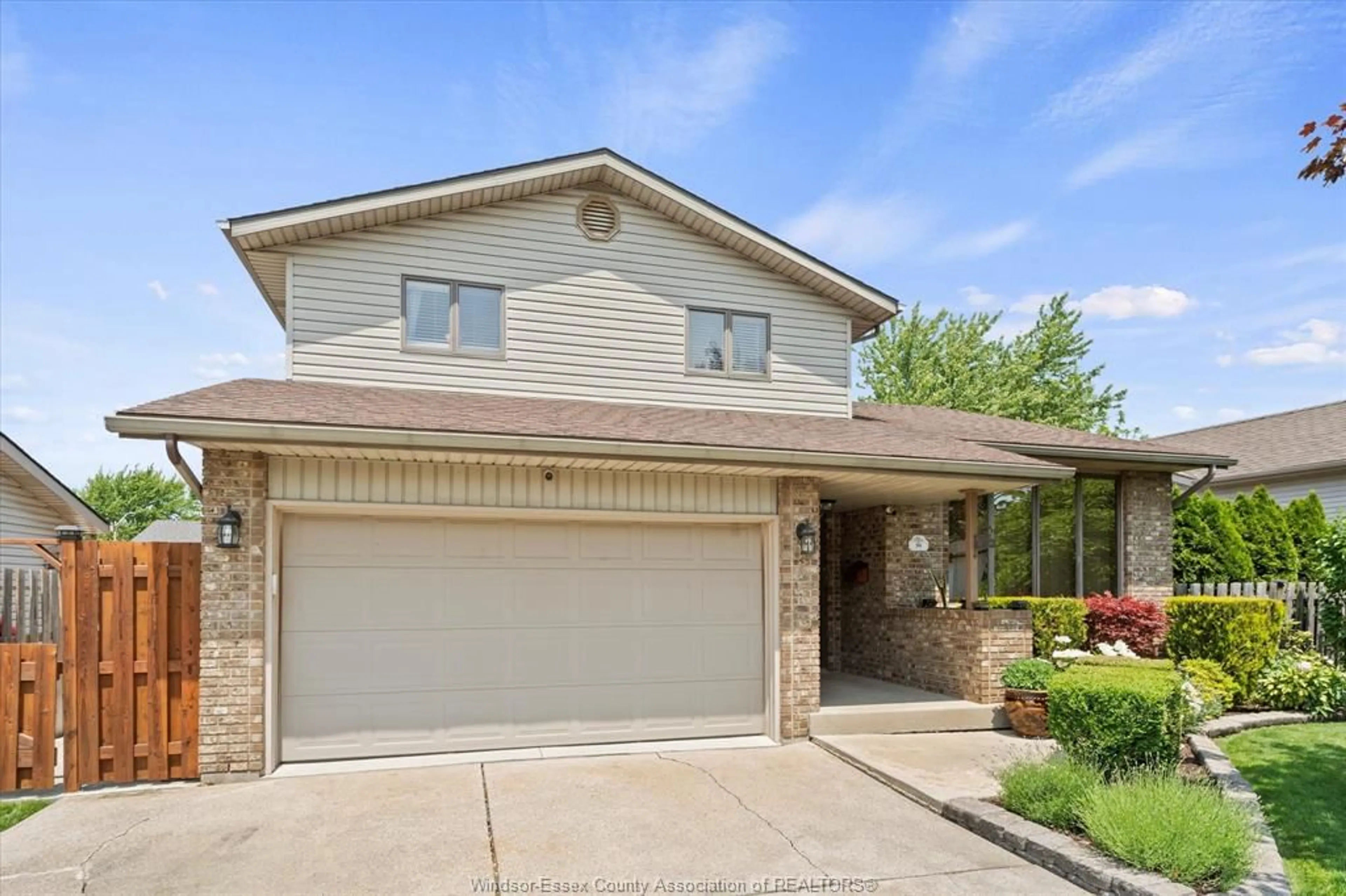 Home with brick exterior material, street for 241 MELANIE Lane, Lakeshore Ontario N0R 1A0