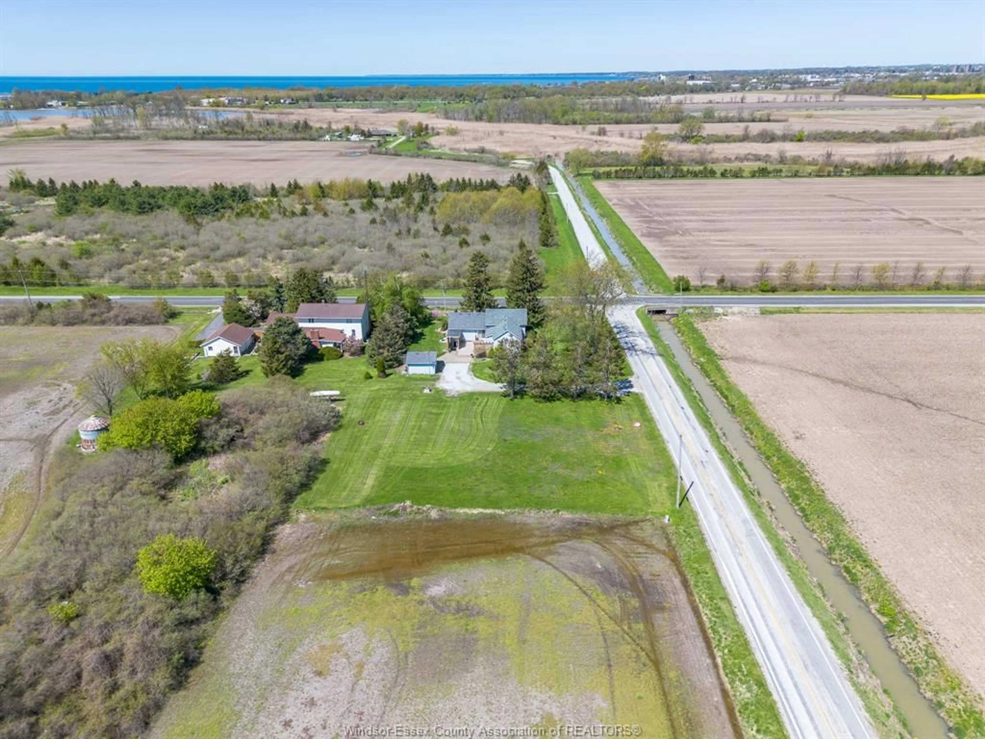 A pic from outside/outdoor area/front of a property/back of a property/a pic from drone, water/lake/river/ocean view for 1300 Mersea Road B, Leamington Ontario N8H 3V7