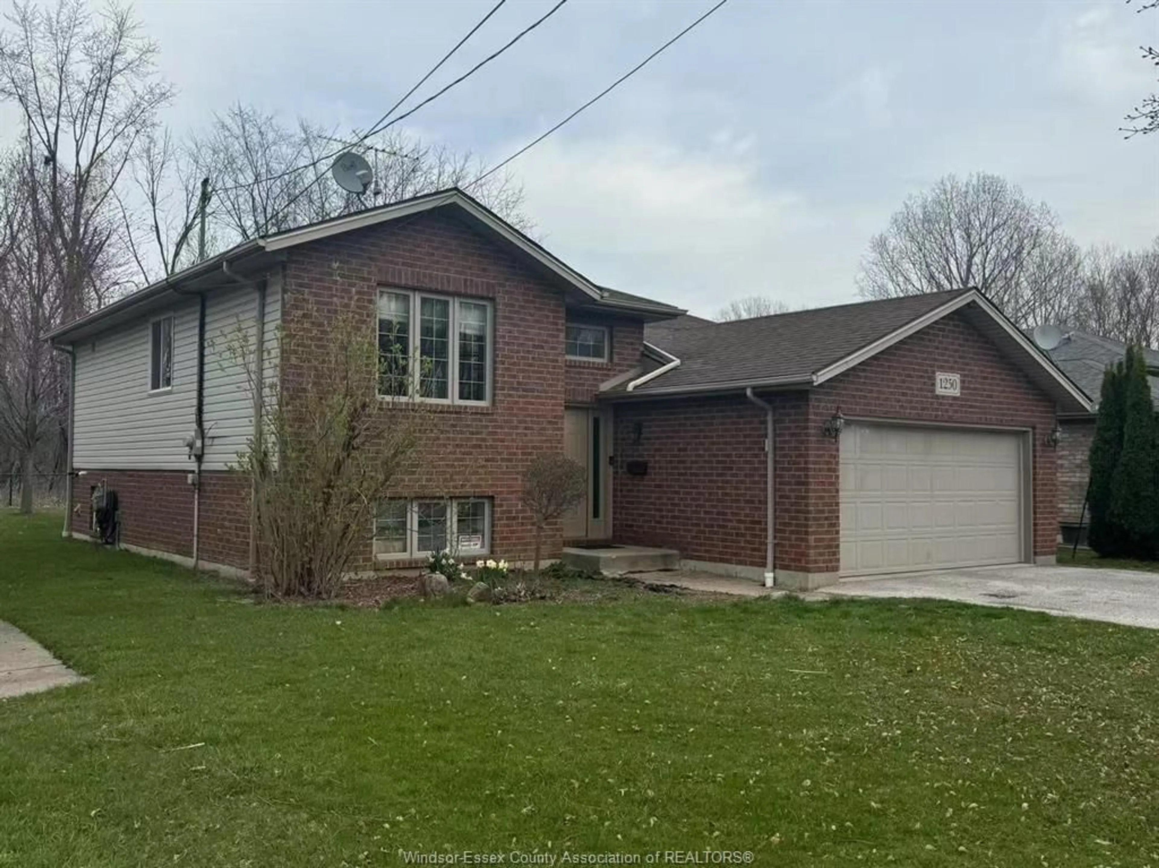 Home with brick exterior material, street for 1250 Armanda St, Windsor Ontario N9C 3W9