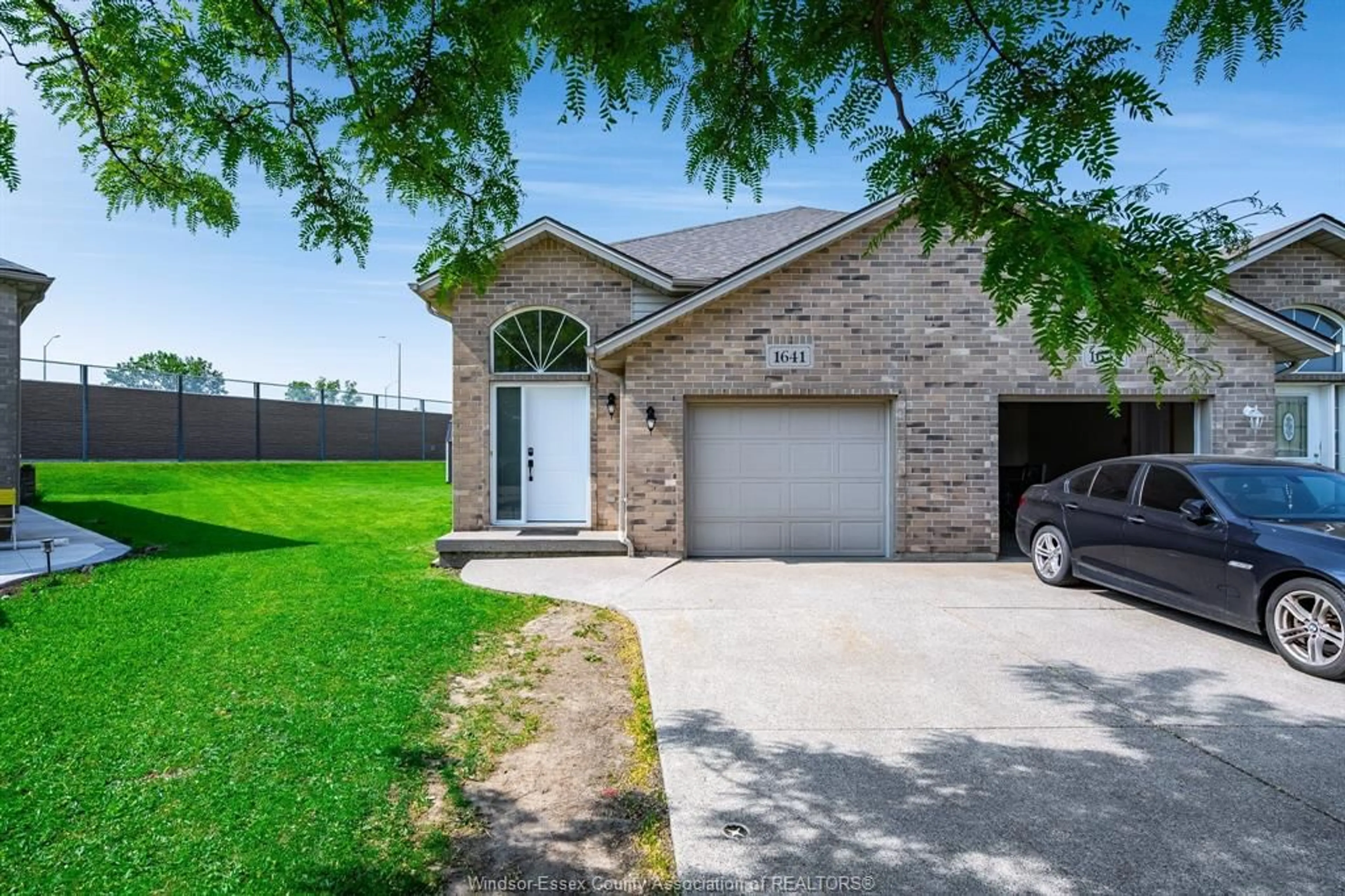 Home with brick exterior material, street for 1641 Tumbleweed Crt, Windsor Ontario N9G 3B9