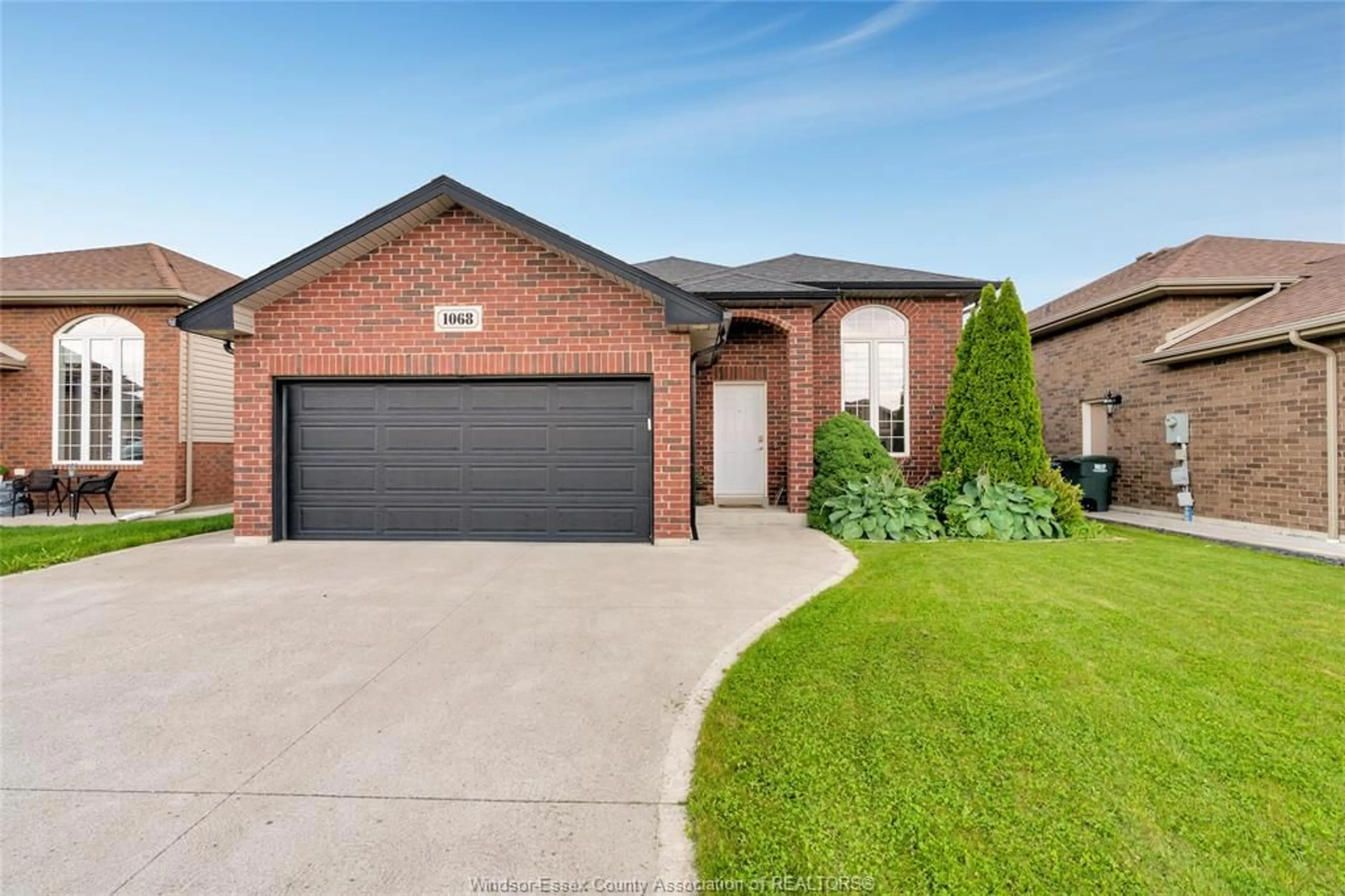 Home with brick exterior material, street for 1068 THUNDERBAY Ave, Windsor Ontario N8P 0C1