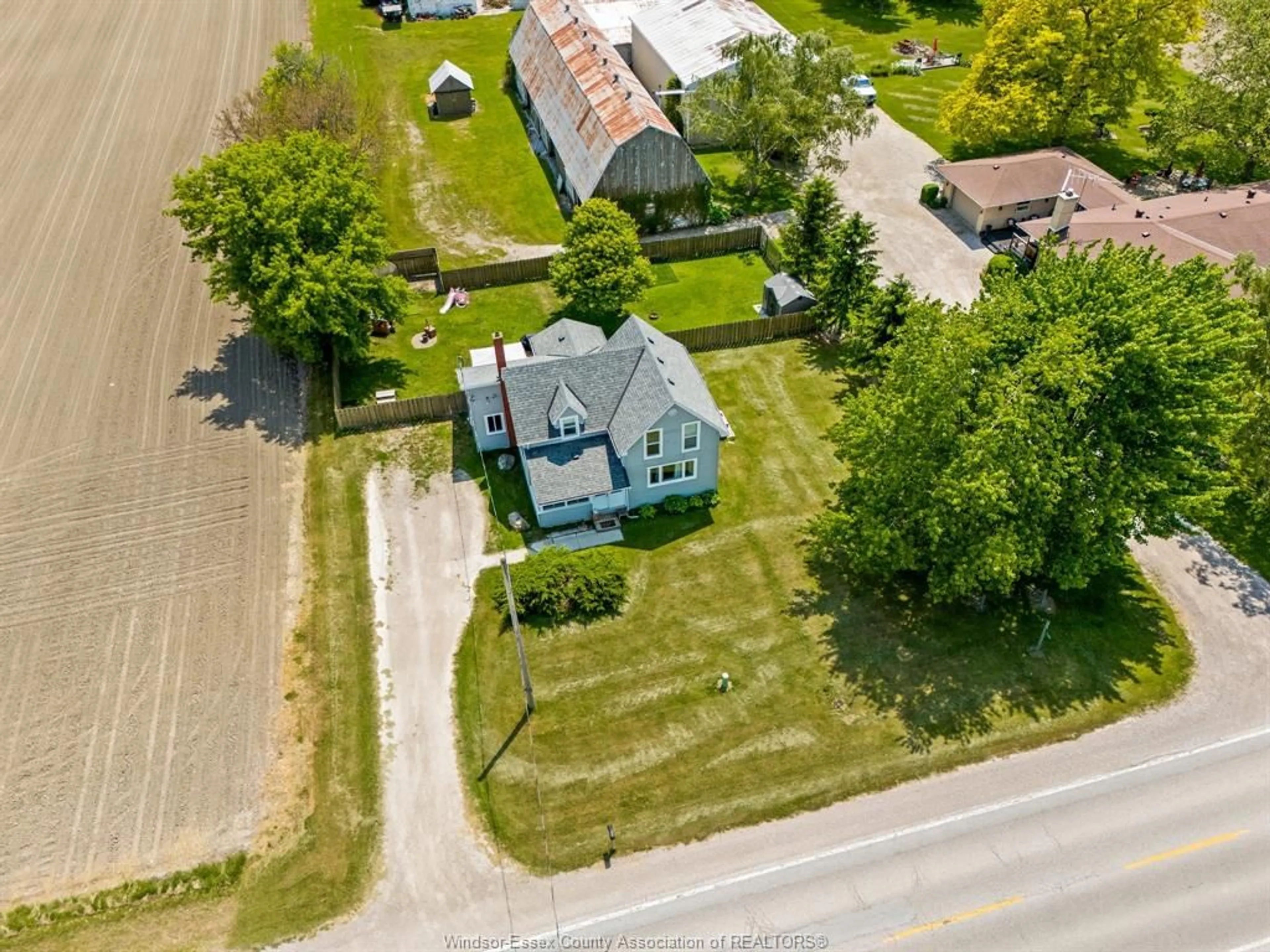 A pic from outside/outdoor area/front of a property/back of a property/a pic from drone, street for 691 ROAD 4, Kingsville Ontario N9Y 2E5