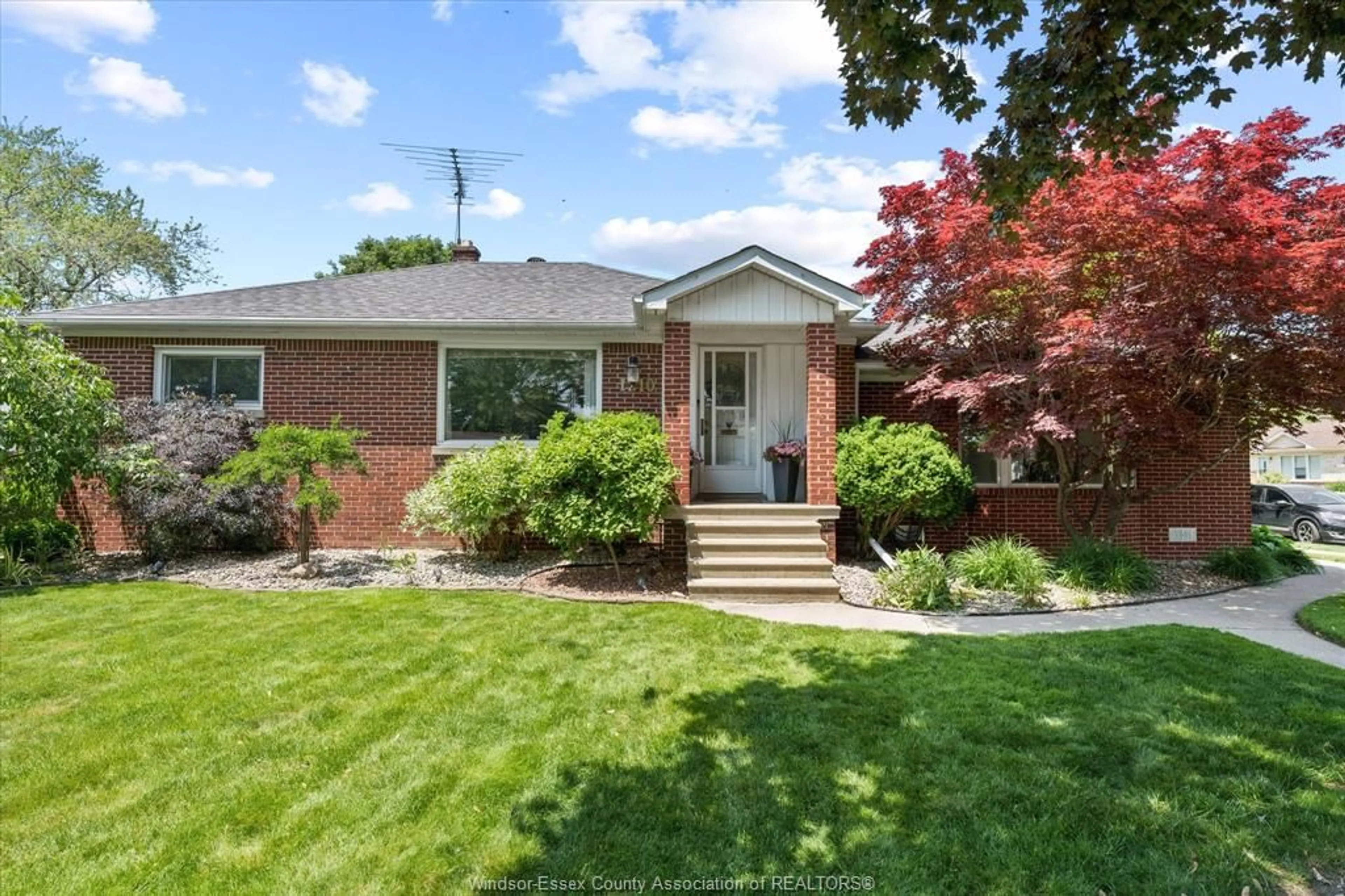 Home with brick exterior material, street for 1210 ROSELAWN Dr, Windsor Ontario N9E 1L6