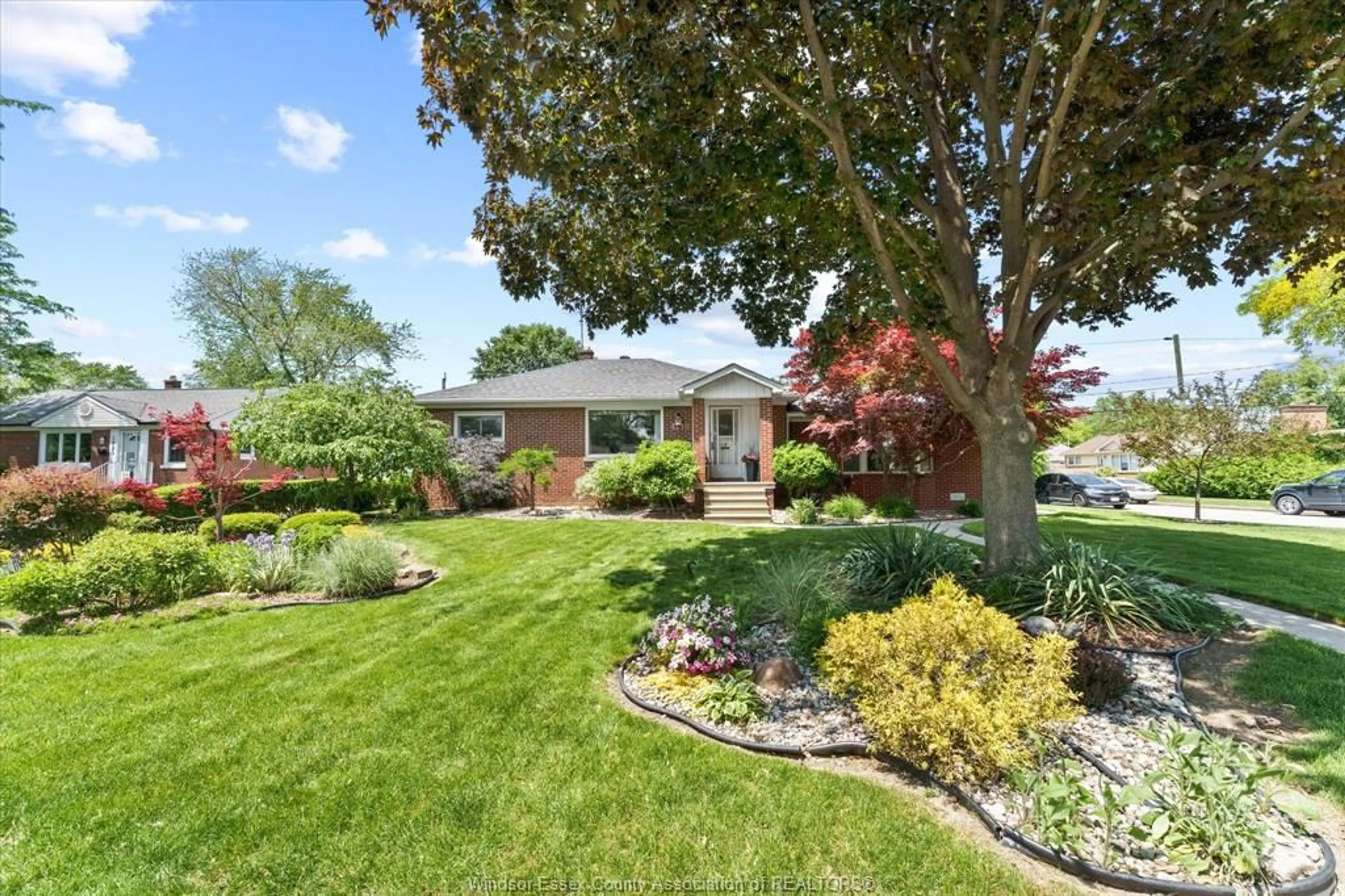 Home with brick exterior material, street for 1210 ROSELAWN Dr, Windsor Ontario N9E 1L6