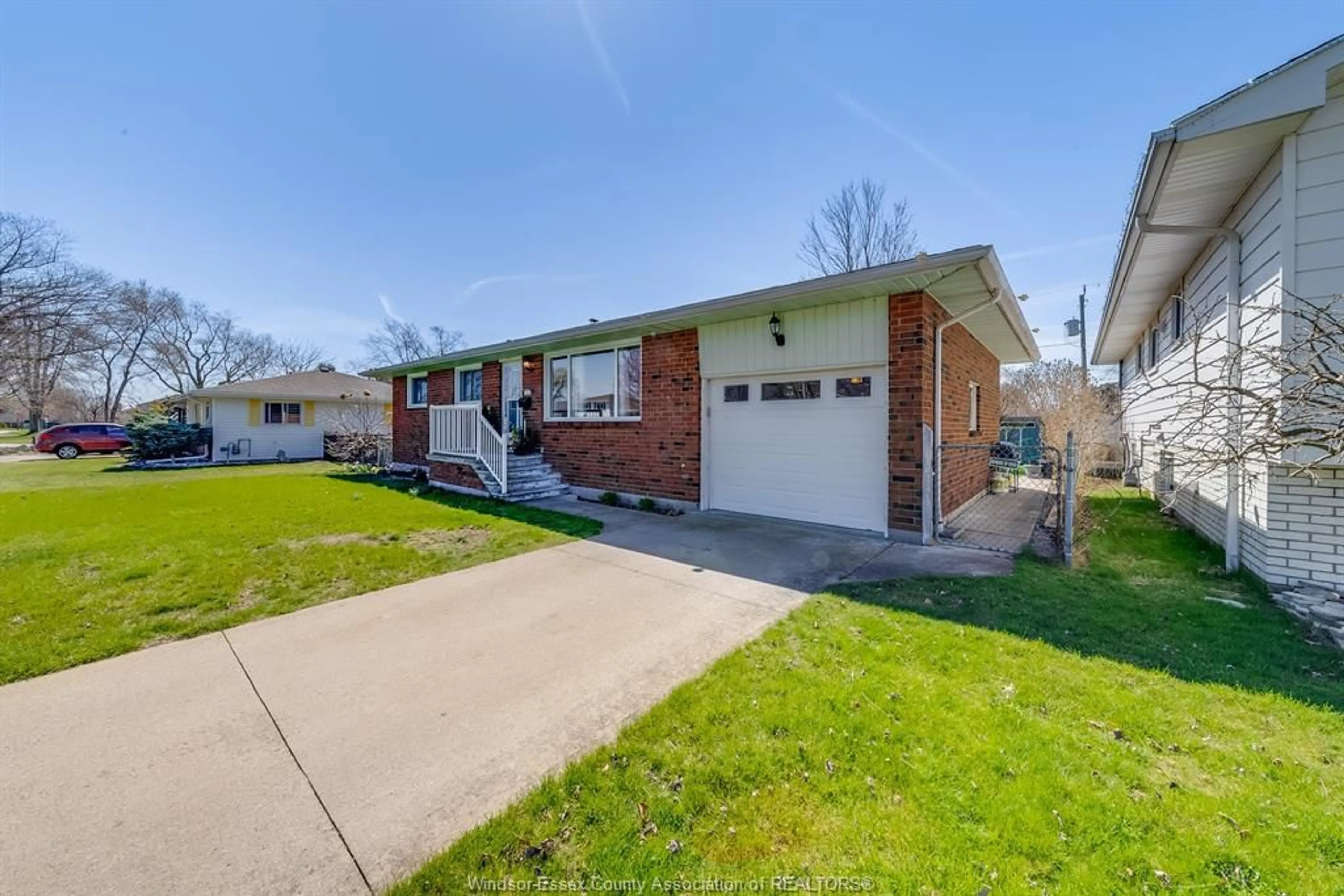 Home with brick exterior material, street for 38 BRUCE Ave, Leamington Ontario N8H 4C5