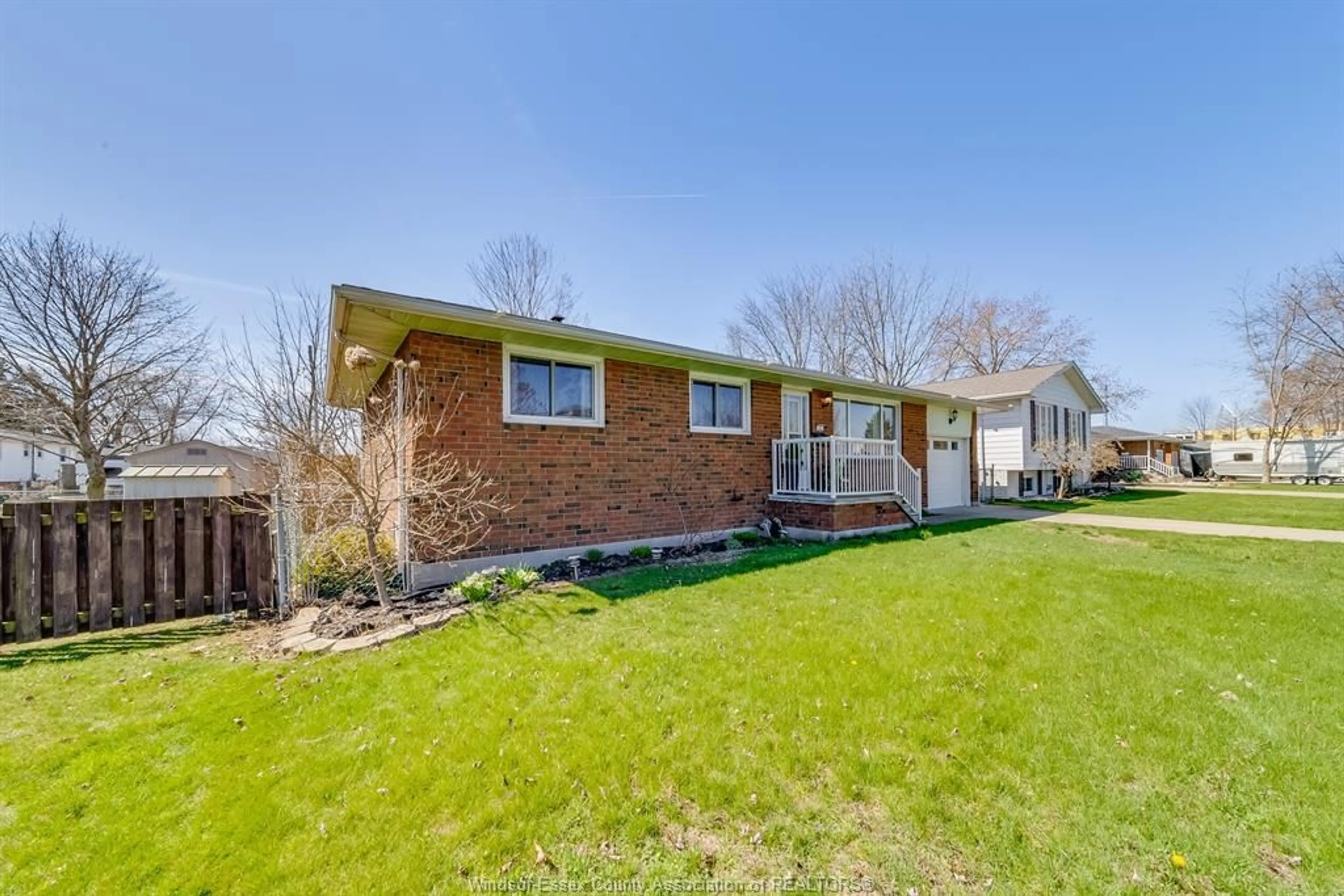 Home with brick exterior material, street for 38 BRUCE Ave, Leamington Ontario N8H 4C5