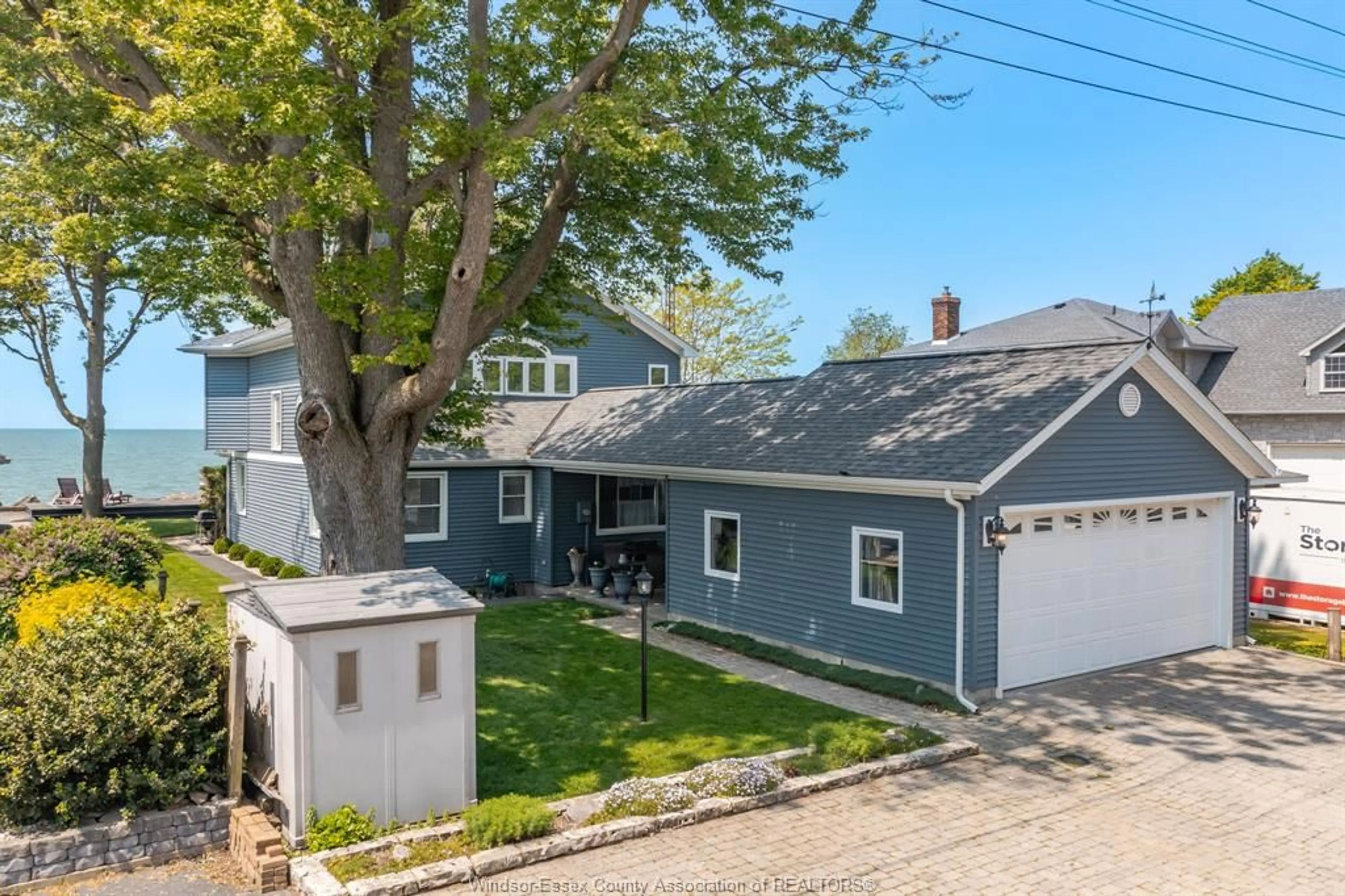 A pic from outside/outdoor area/front of a property/back of a property/a pic from drone, street for 700 POINT PELEE, Leamington Ontario N8H 3V4