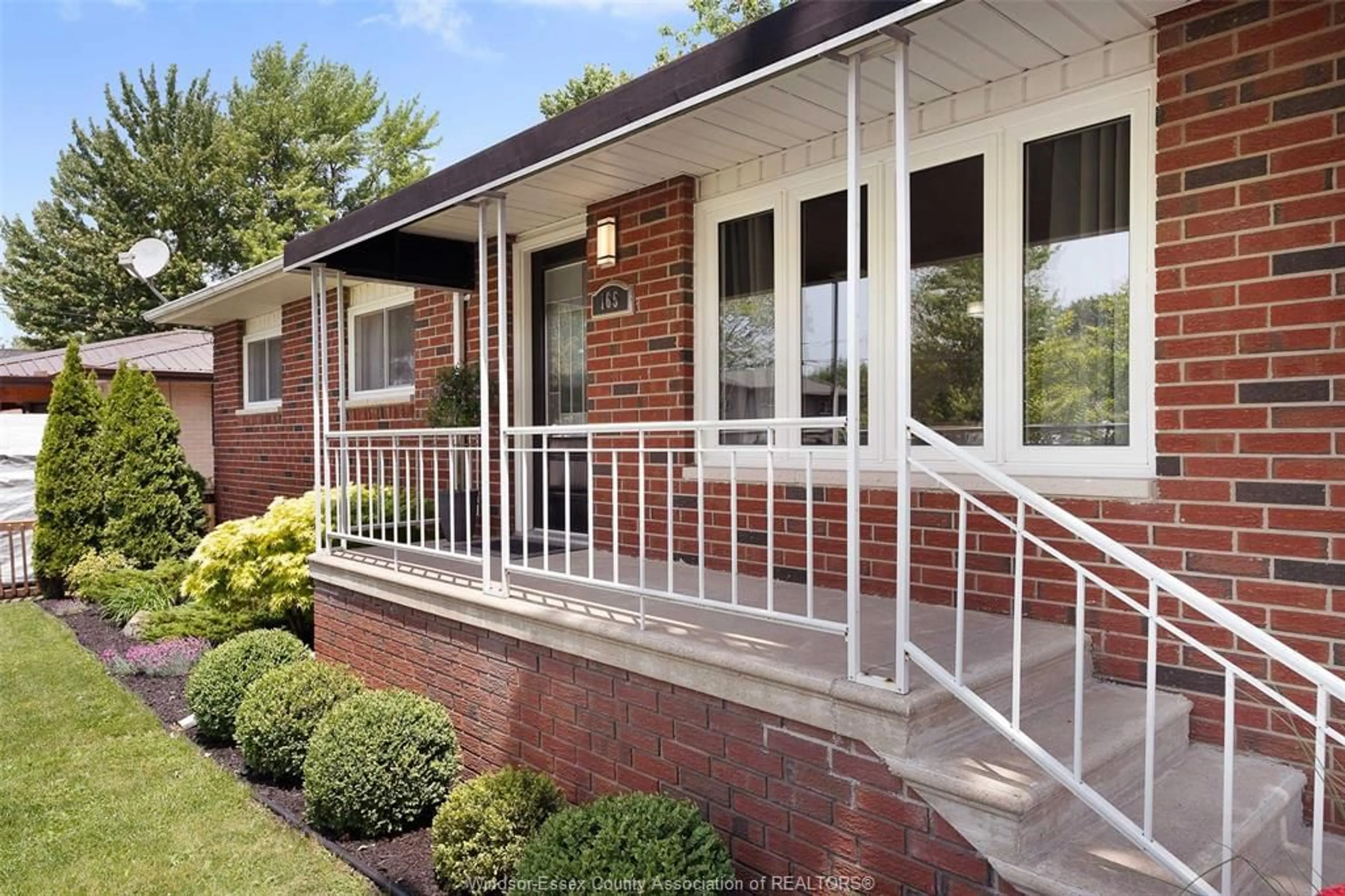Home with brick exterior material, street for 165 THOMAS St, Essex Ontario N8M 2G2
