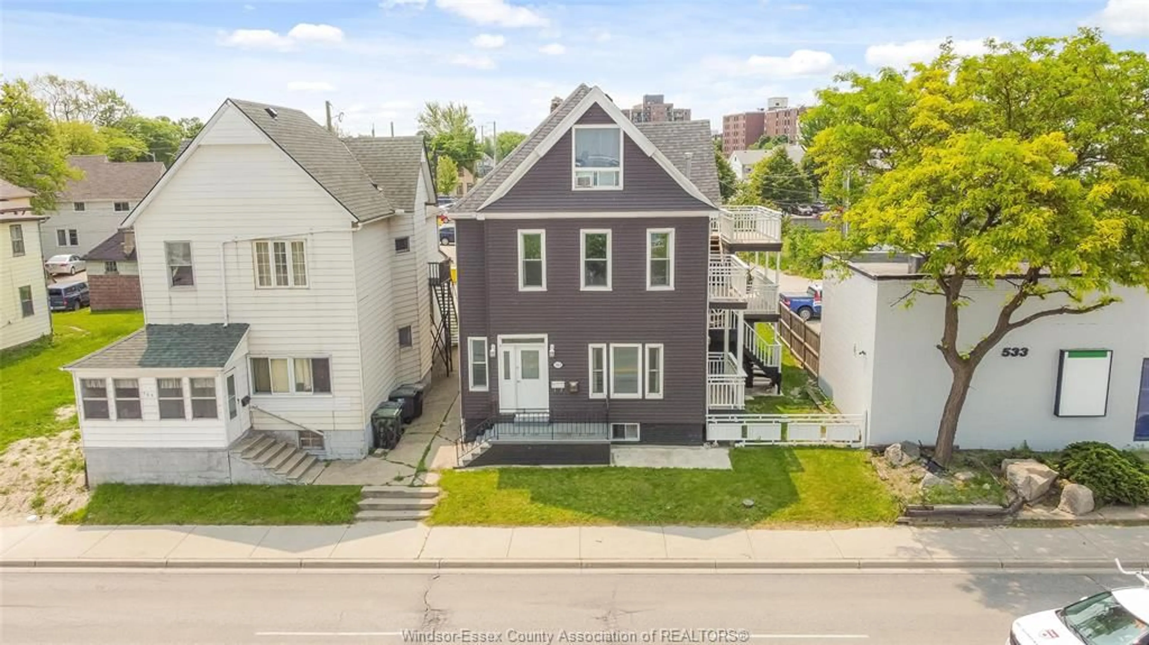 A pic from outside/outdoor area/front of a property/back of a property/a pic from drone, street for 561 RIVERSIDE Dr, Windsor Ontario N9A 2T1