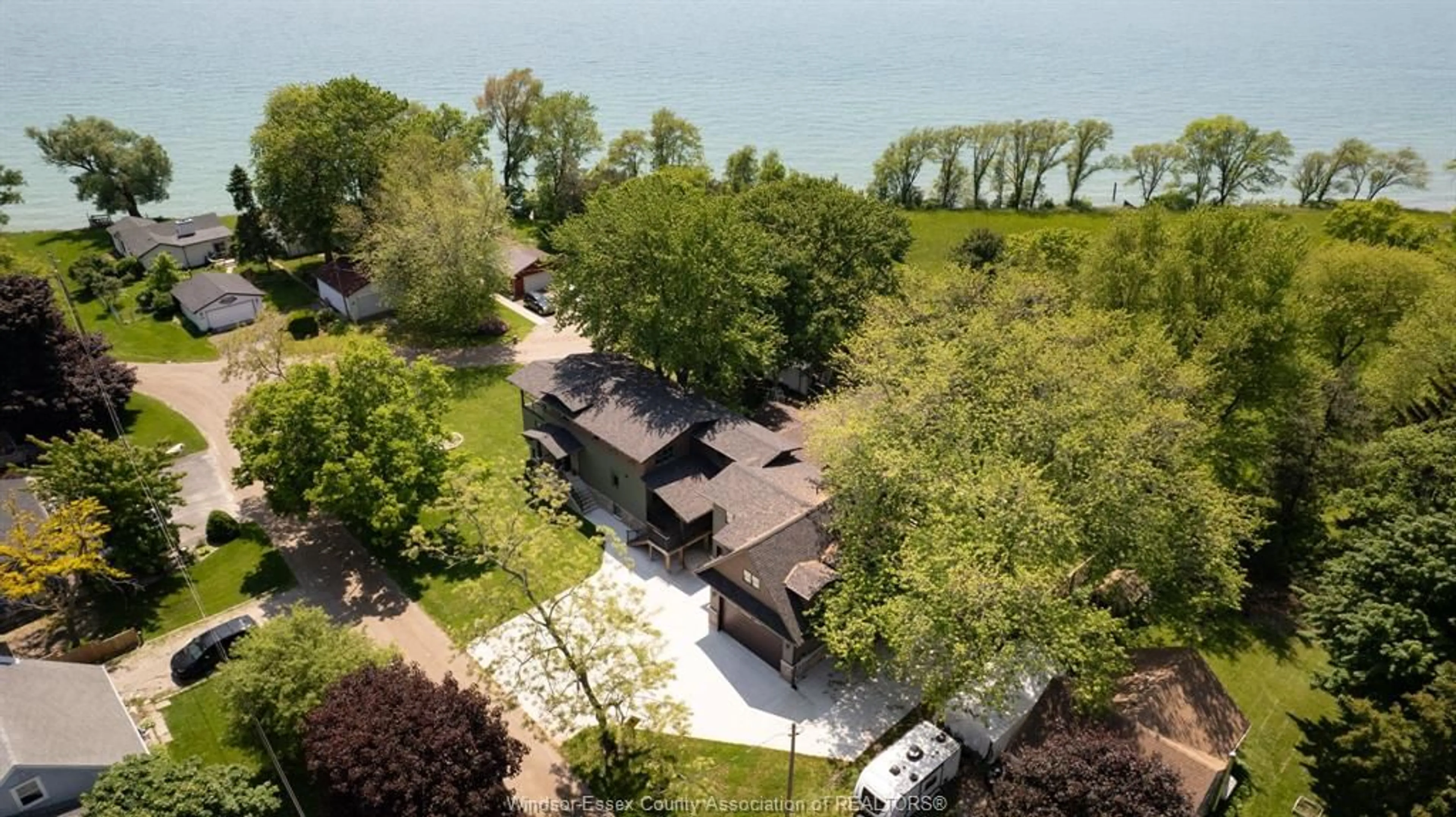 A pic from outside/outdoor area/front of a property/back of a property/a pic from drone, water/lake/river/ocean view for 103 MARSDEN BEACH, Colchester Ontario N0R 1G0