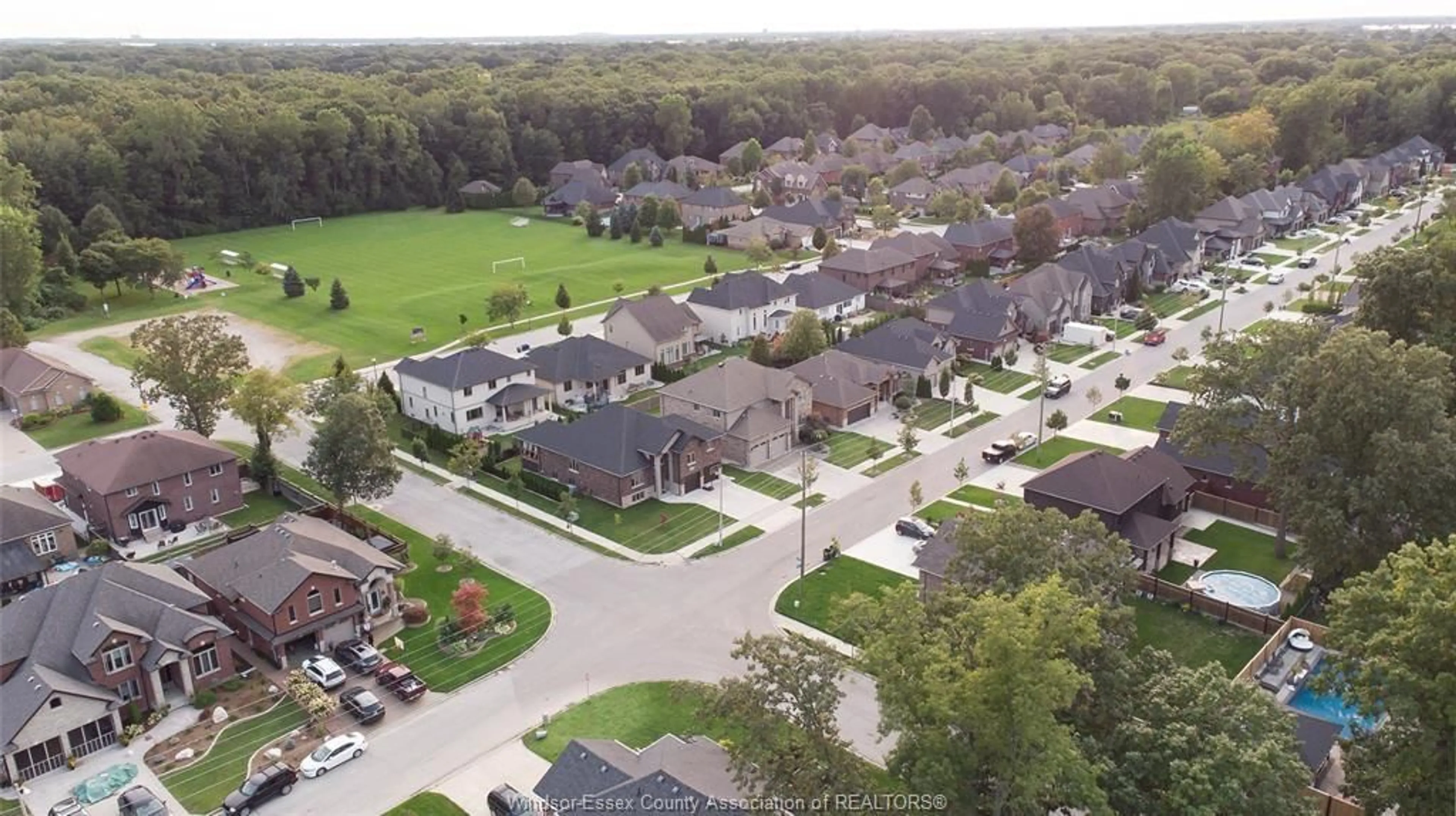 A pic from outside/outdoor area/front of a property/back of a property/a pic from drone, street for 1385 MAPLE, LaSalle Ontario N9J 0B3
