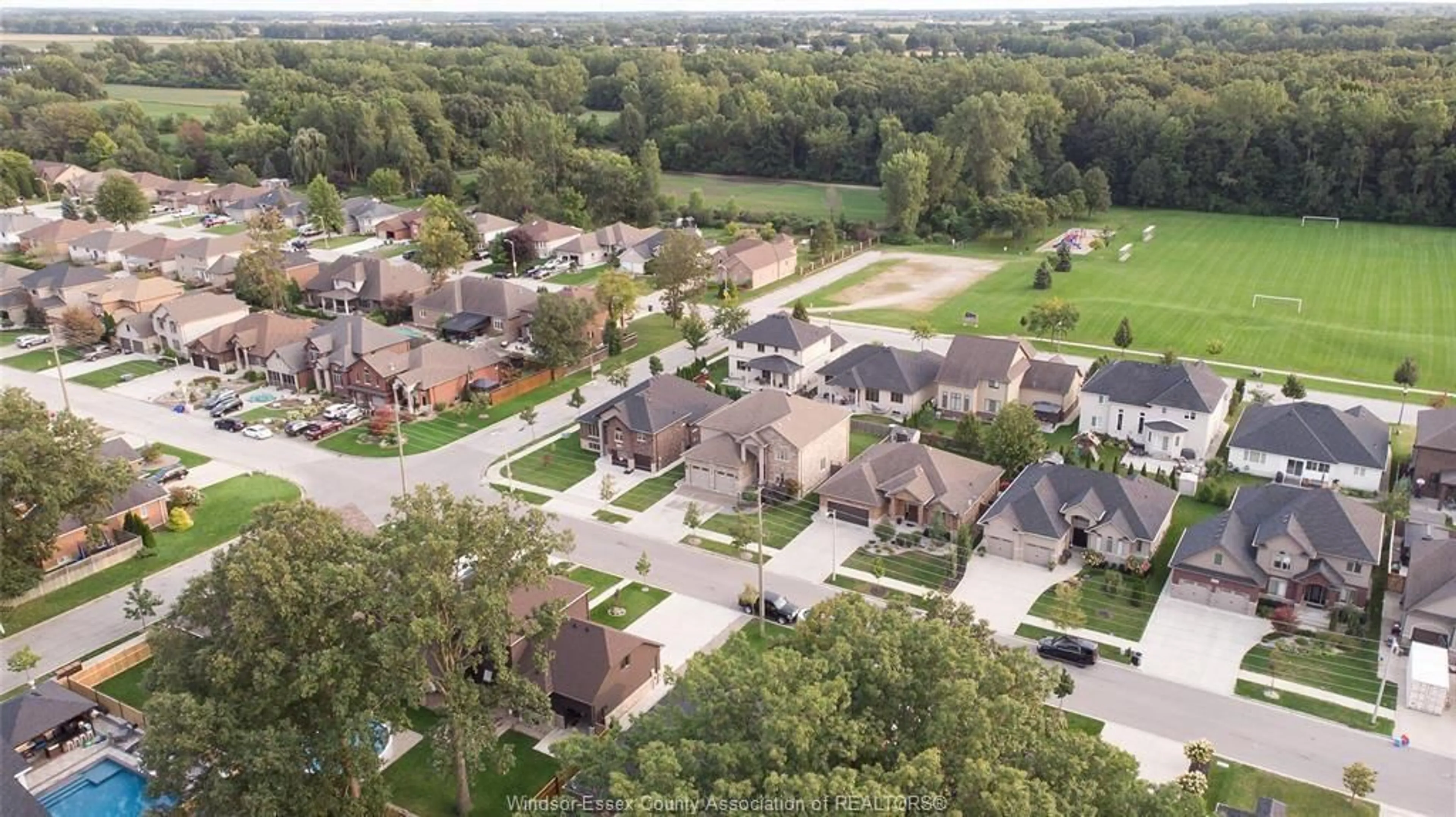 A pic from outside/outdoor area/front of a property/back of a property/a pic from drone, street for 1385 MAPLE, LaSalle Ontario N9J 0B3