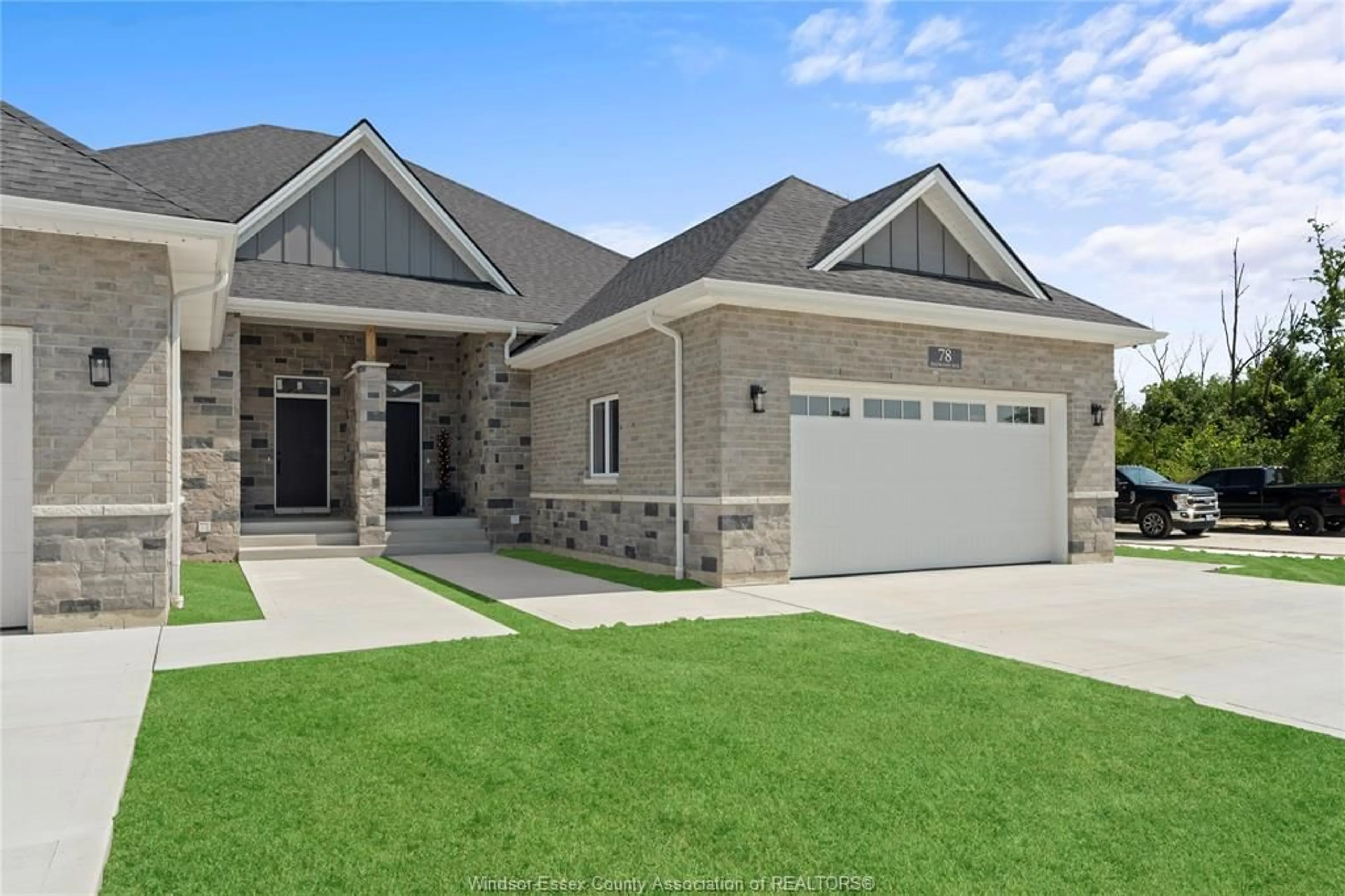 Home with brick exterior material, street for 77 BELLEVIEW Dr, Cottam Ontario N0R 1B0