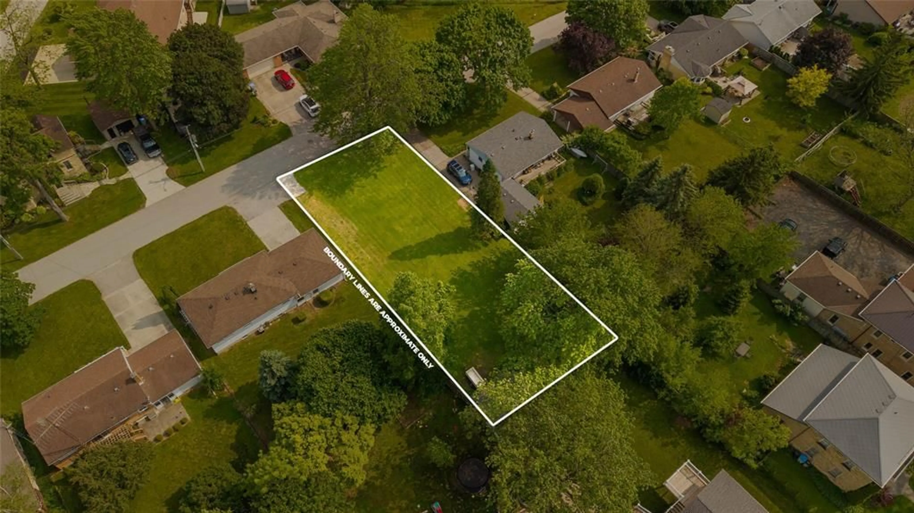 A pic from outside/outdoor area/front of a property/back of a property/a pic from drone, street for 24 MAC KENZIE St, Lambton Shores Ontario N0N 1J0