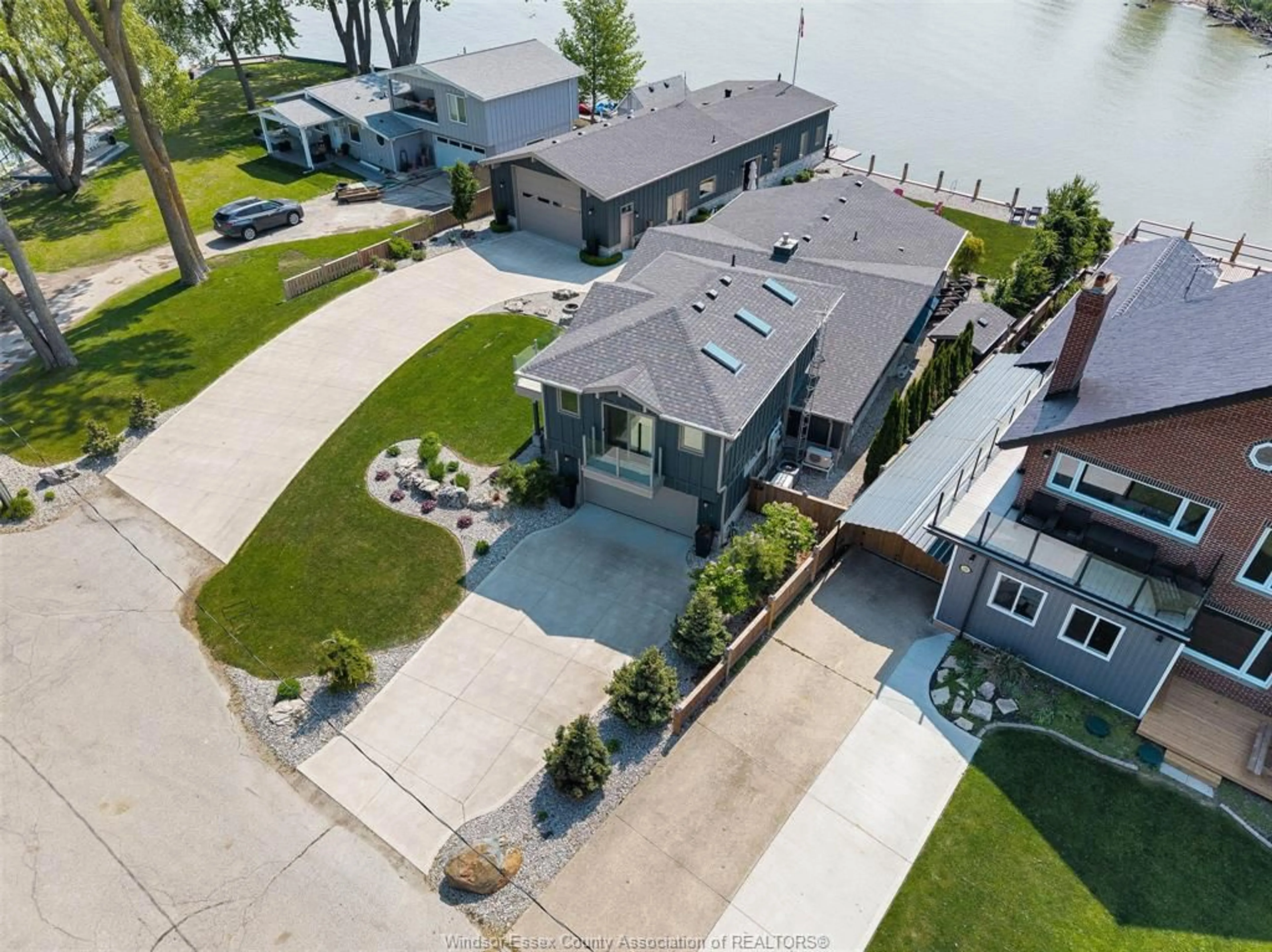 A pic from outside/outdoor area/front of a property/back of a property/a pic from drone, water/lake/river/ocean view for 148 RUSTON Dr, Lakeshore Ontario N8L 0G5